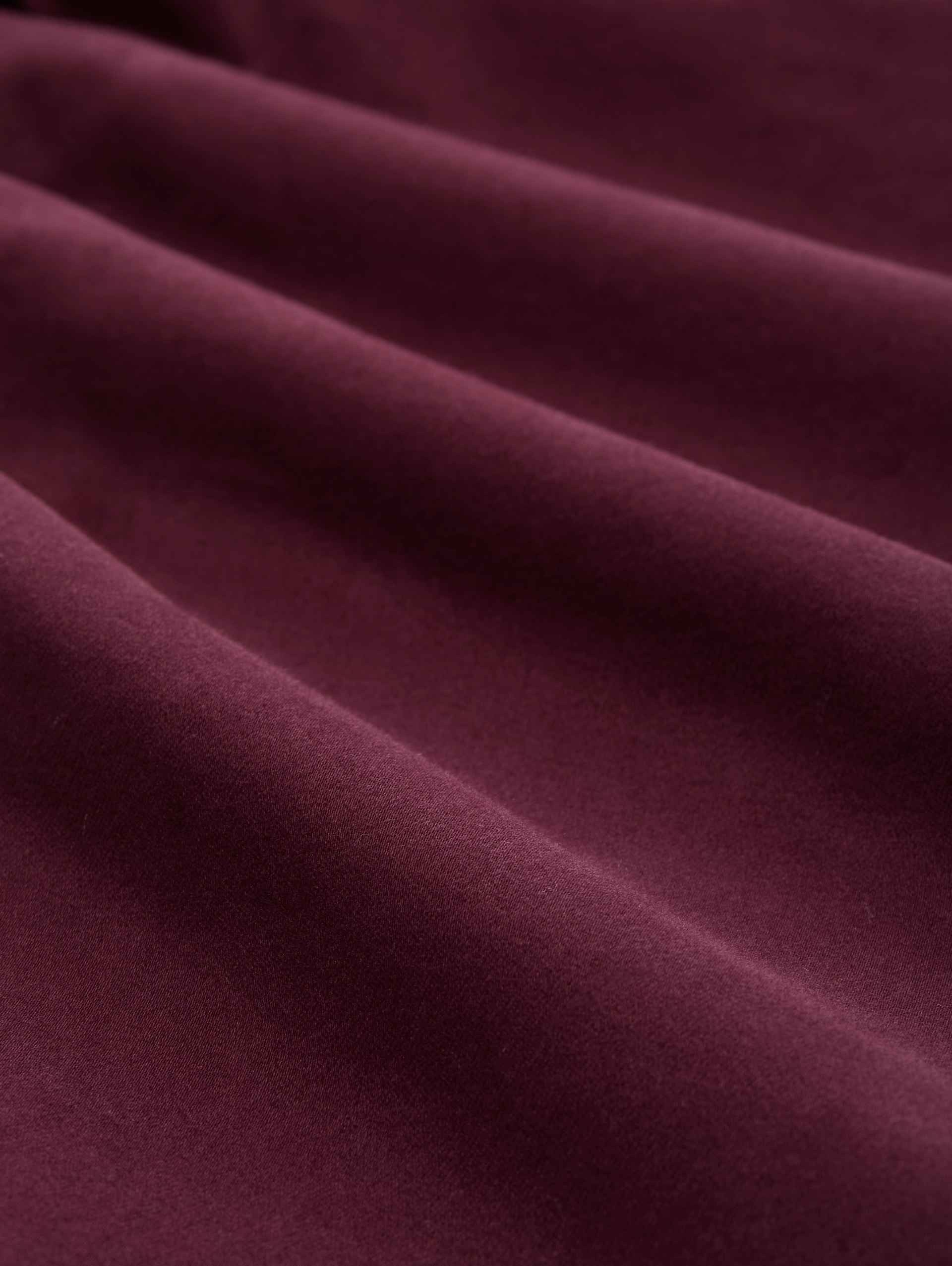 Tapered relaxed trousers - bordeaux red - Material view