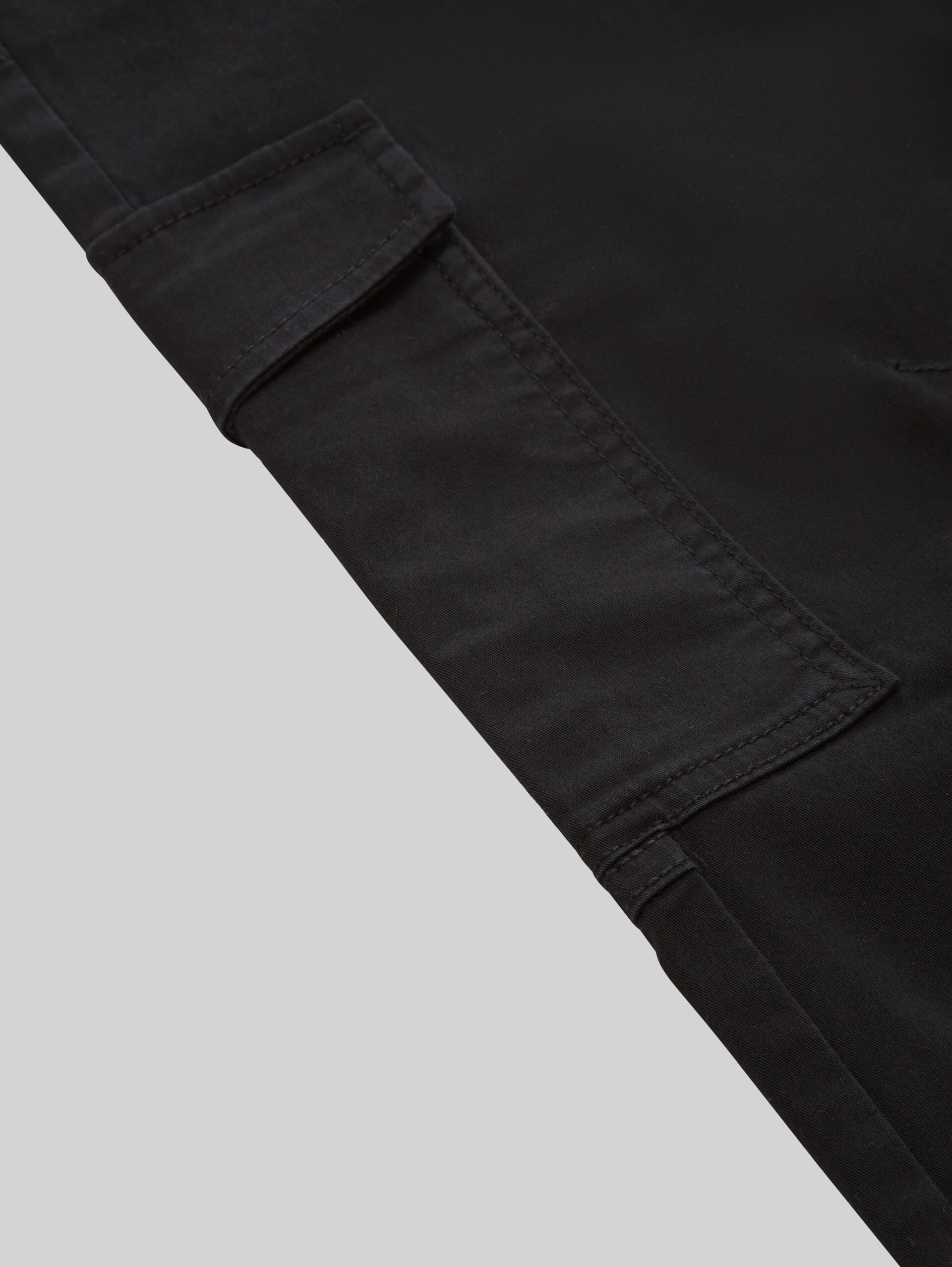 Cargo trousers with patch pockets - Black - Detail model view