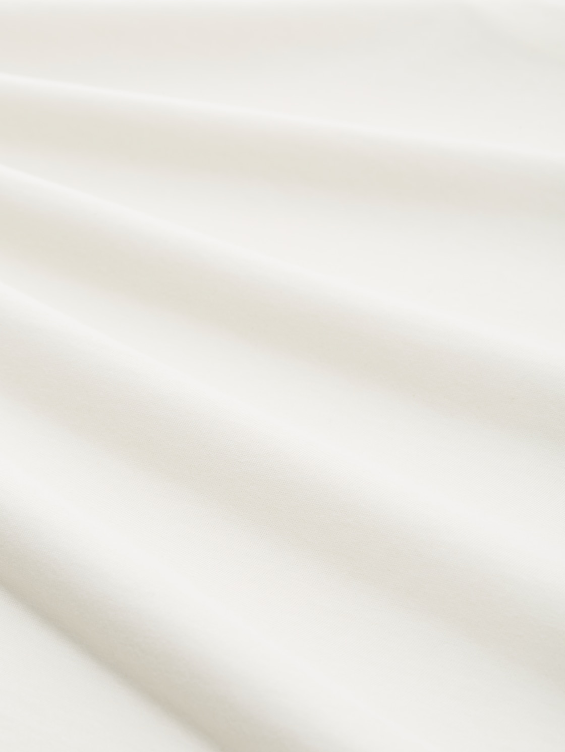 Boxy Fit T-Shirt aus Baumwolle - Gardenia White - Material-Ansicht