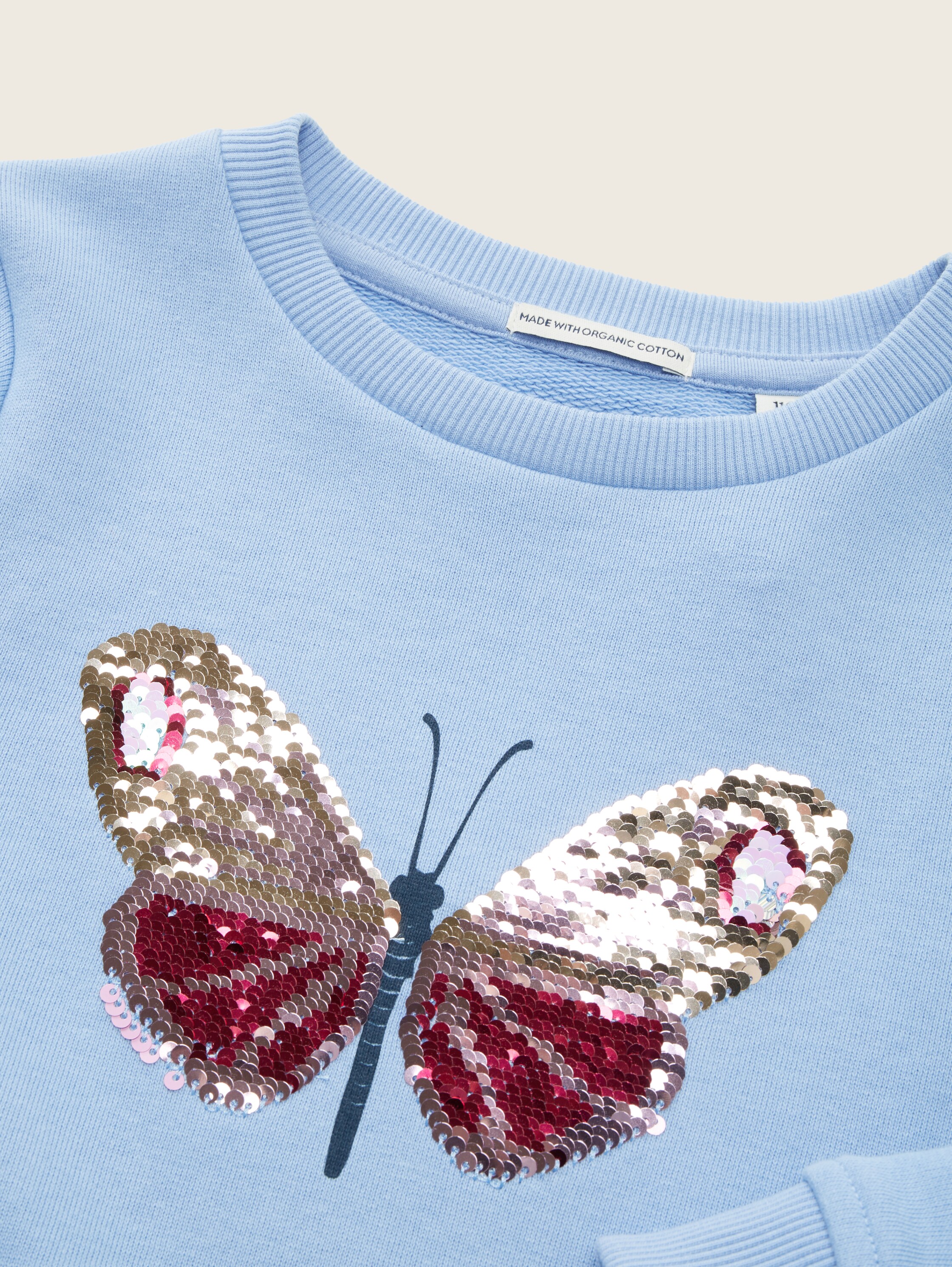 Sweatshirt met zijsplitten - Calm Blue - Detailaanzicht model