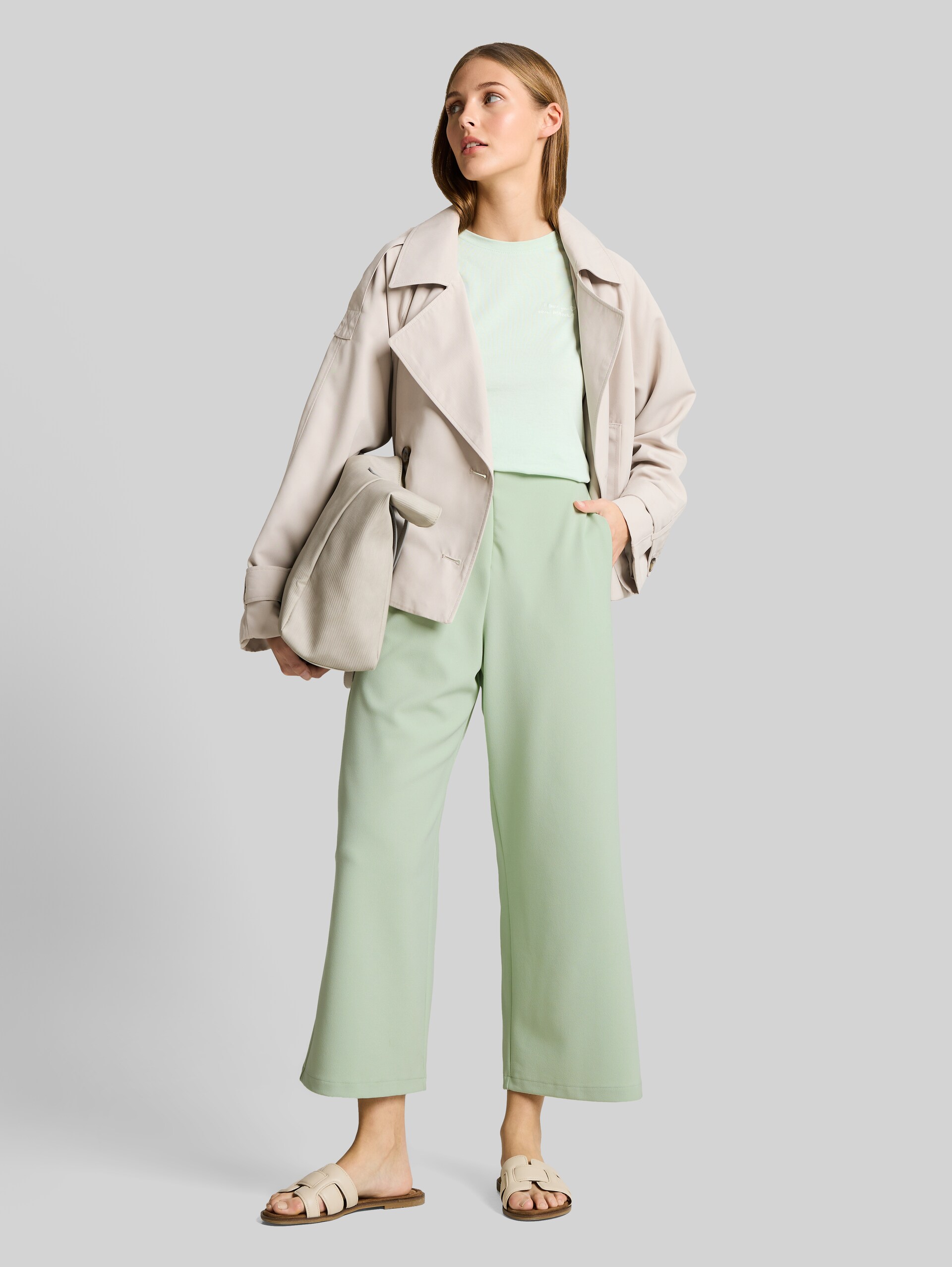High-waisted culottes - light matcha green - Model front view