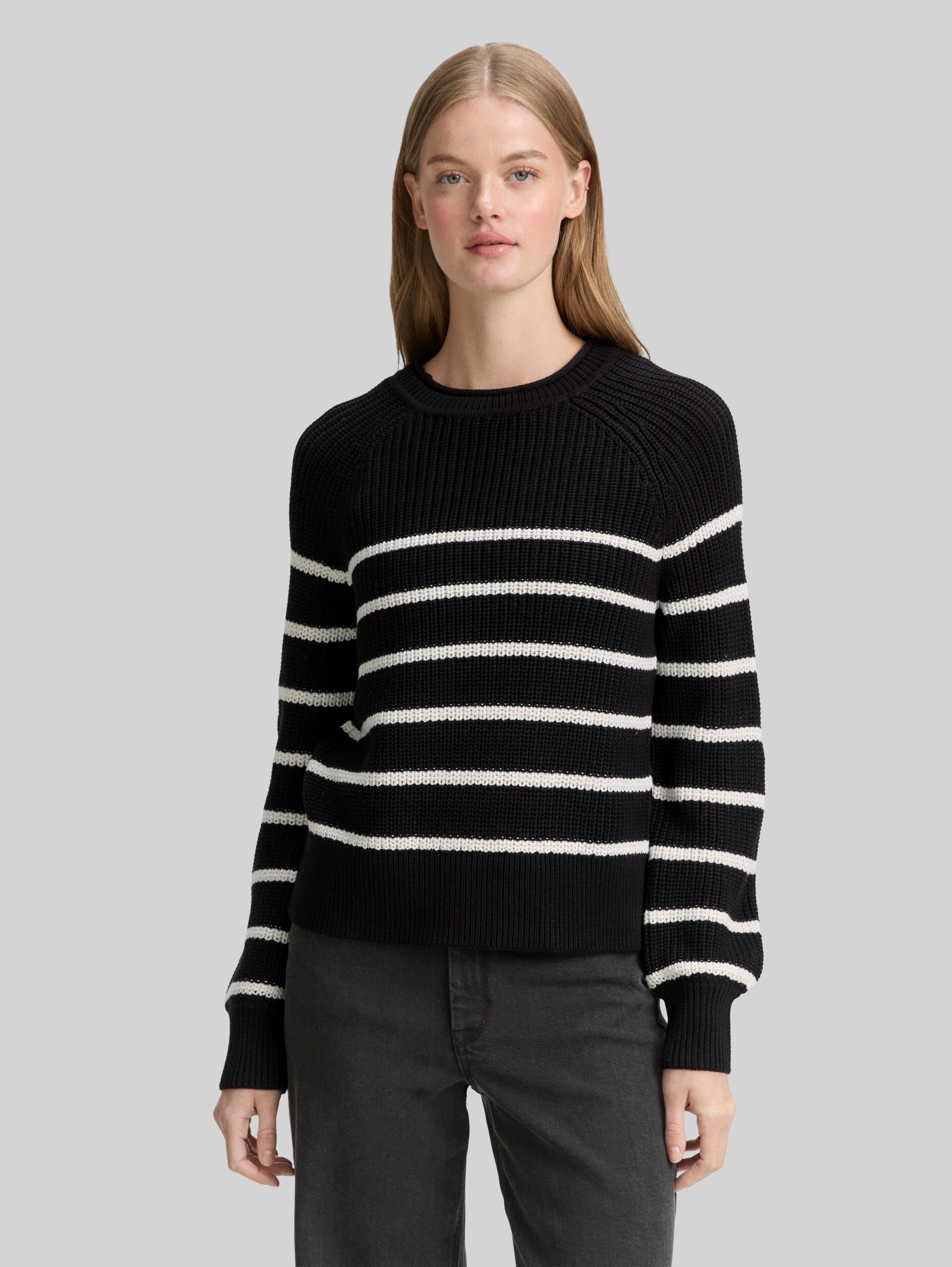 Knitted jumper with slightly puffed sleeves - placed black white stripe - Neckline model front view