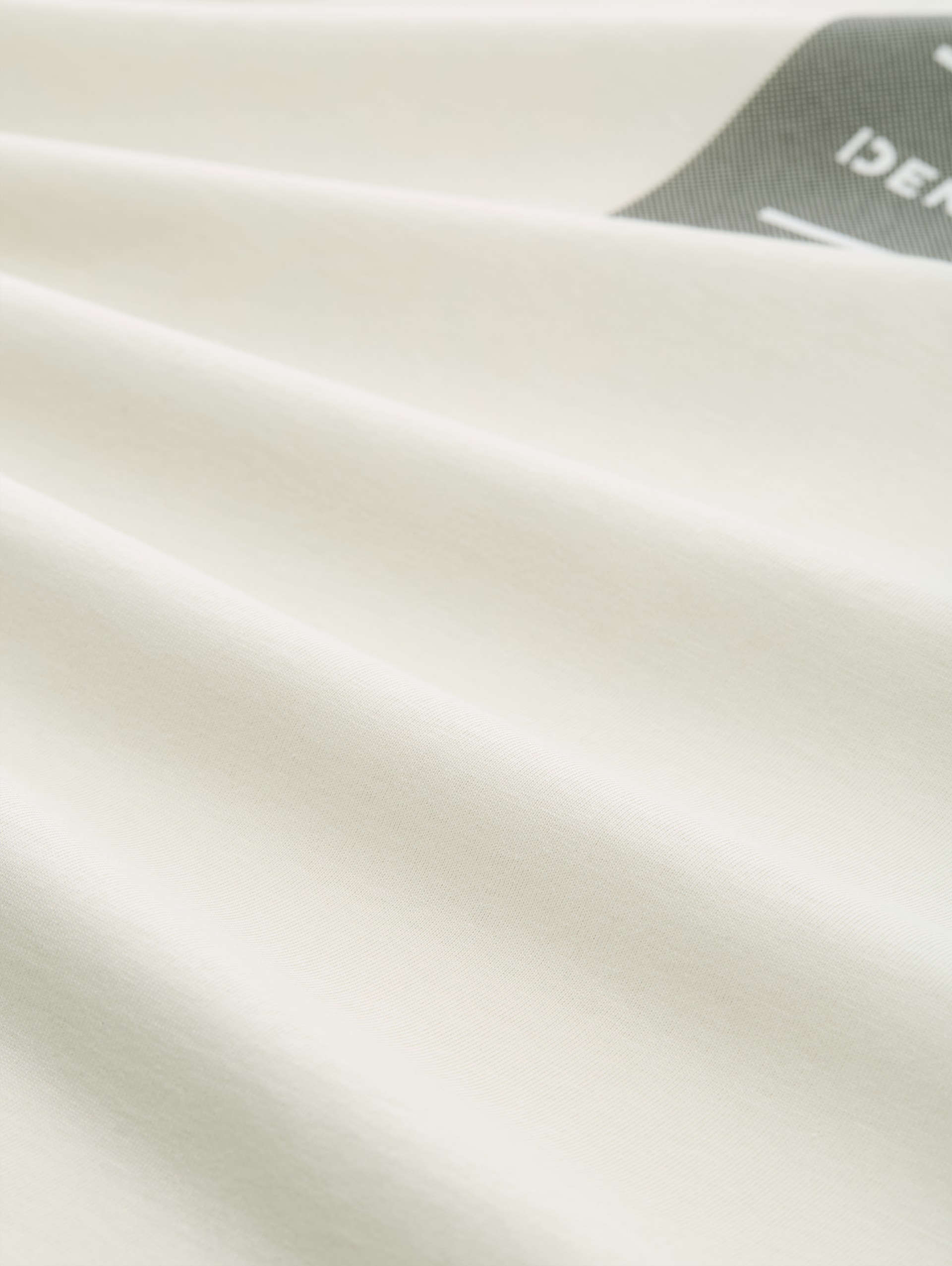 Basic T-Shirt mit Logo-Print - Natural White - Material-Ansicht