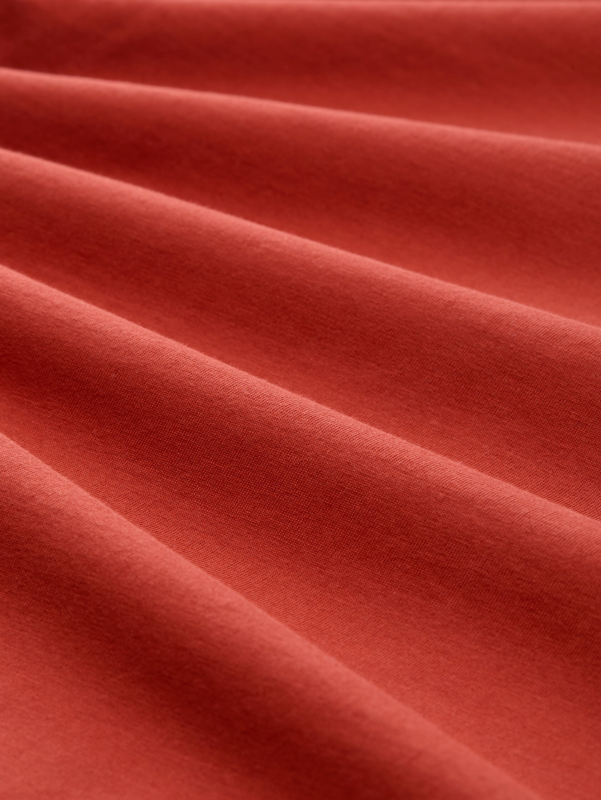 Basic T-shirt met logo-print - currant red - Materiaalweergave
