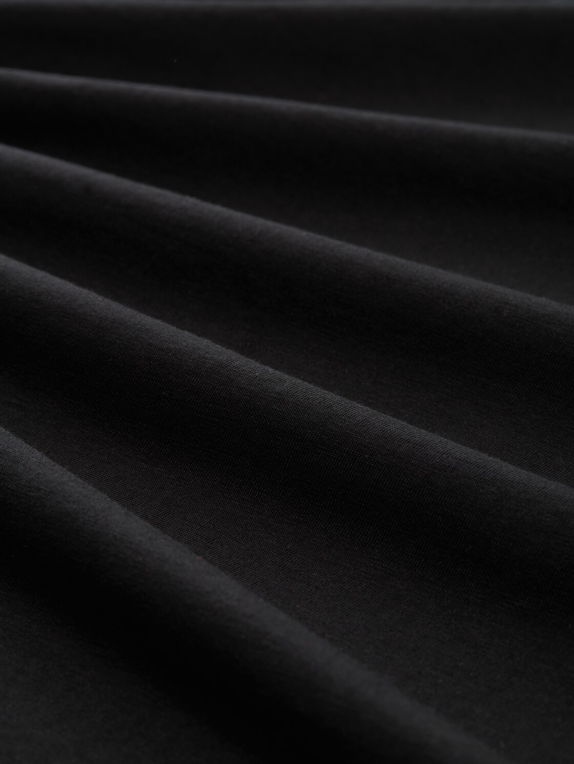 Relaxed Fit T-Shirt aus Baumwolle - Black - Material-Ansicht