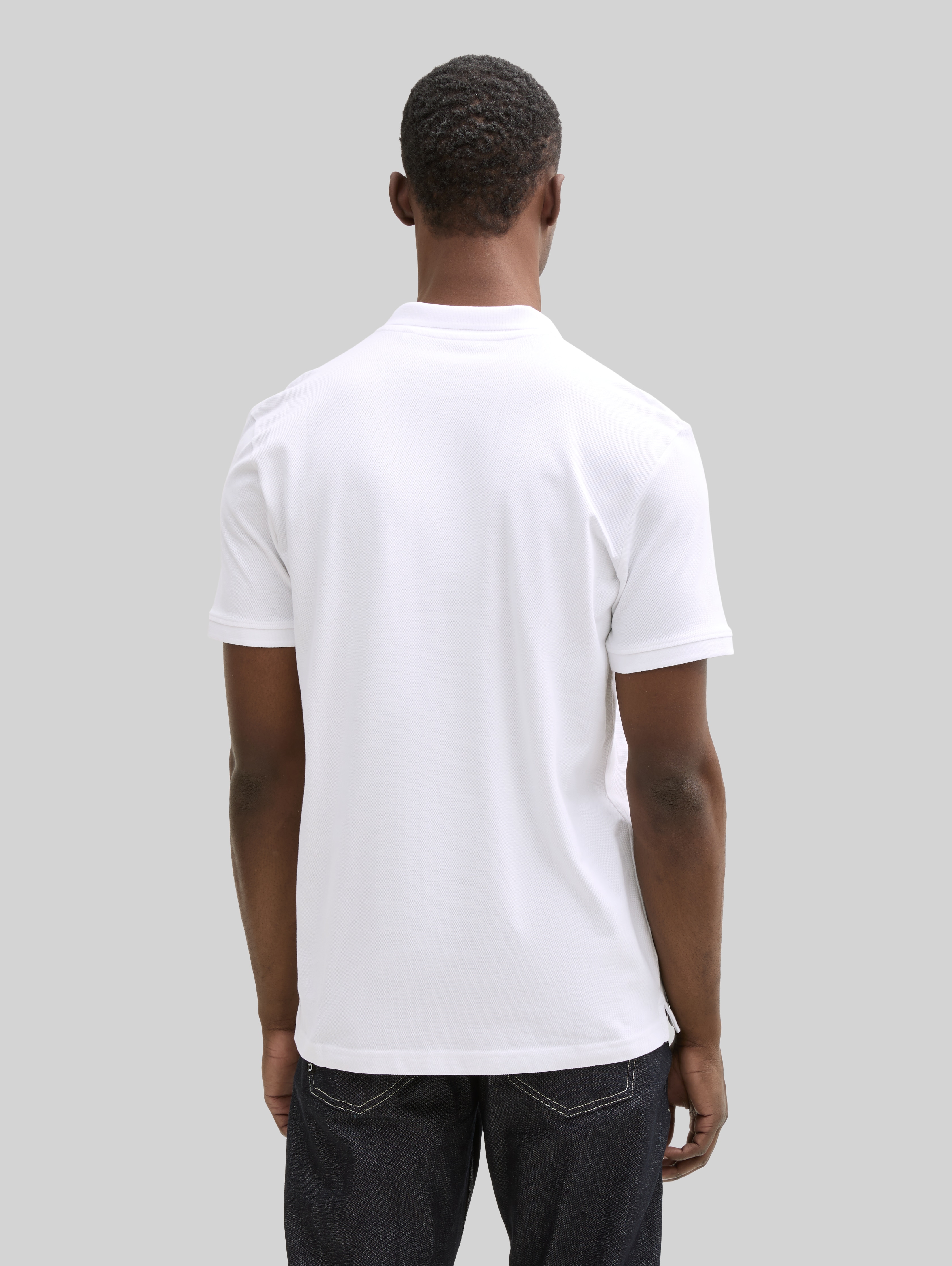 Cotton piqué polo shirt in white by Tom Tailor