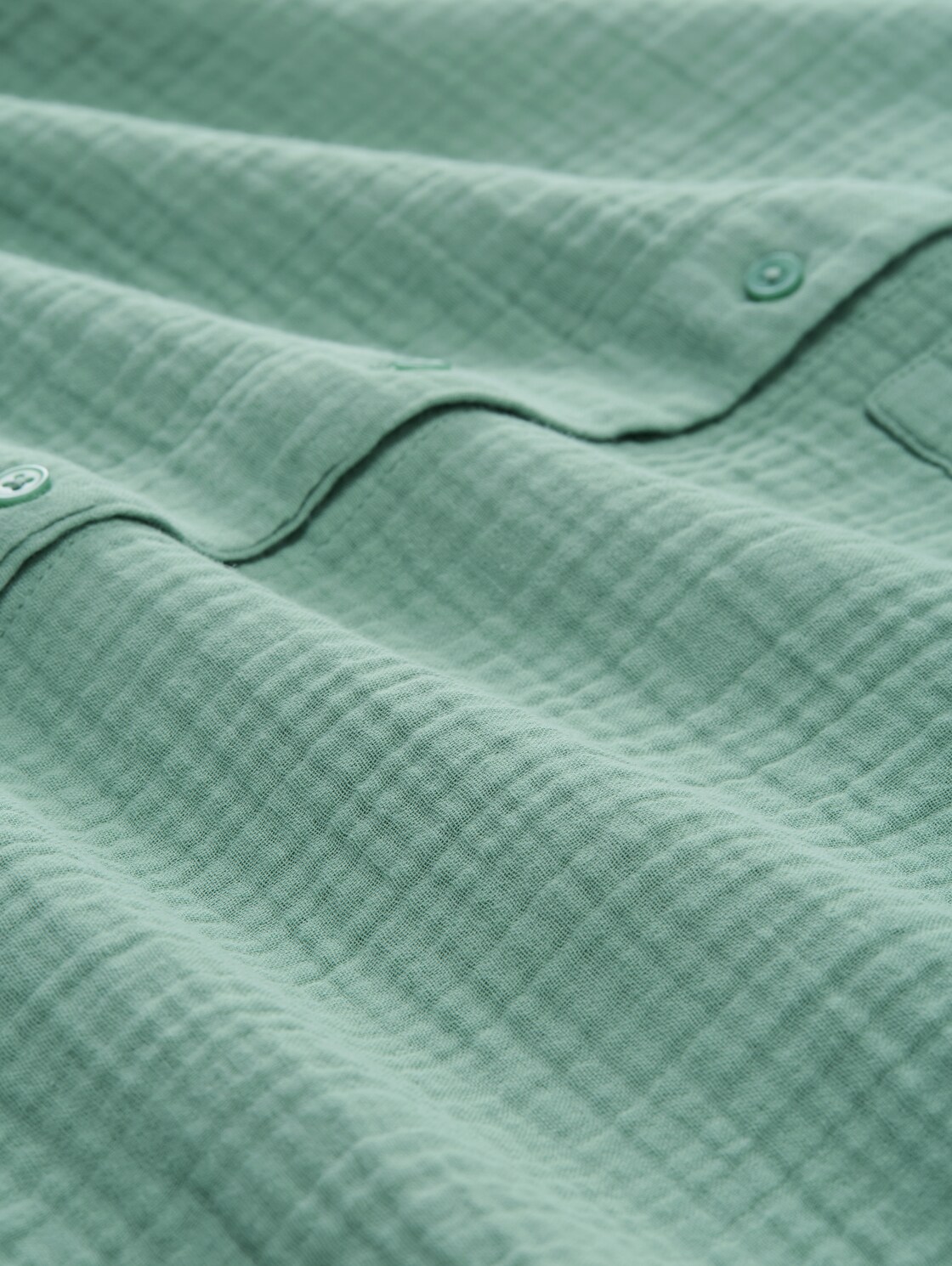 Oversize Musselin Hemdbluse - Faded Green - Material-Ansicht