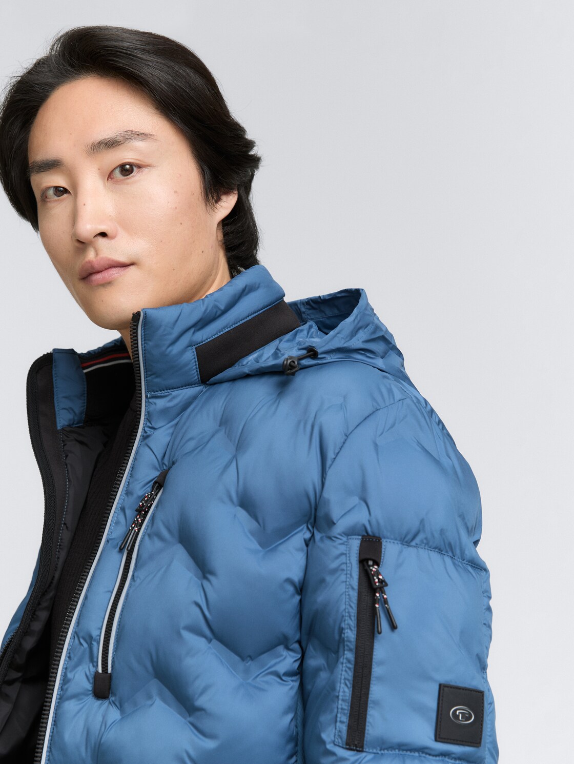 Hybrid Lightweight Steppjacke mit verstaubarer Kapuze - real teal blue - Detail-Model-Ansicht