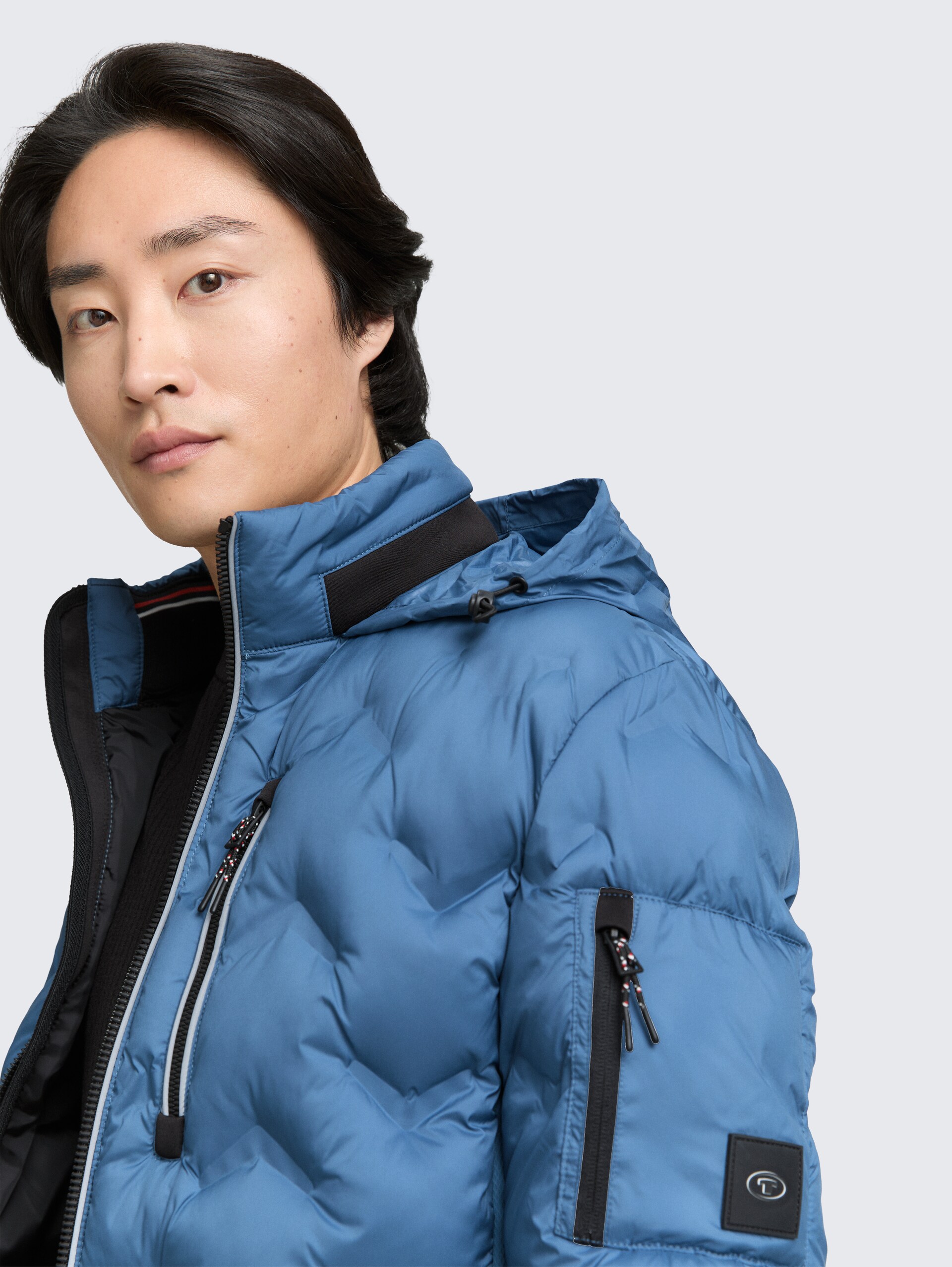 Hybrid Lightweight Steppjacke mit verstaubarer Kapuze - real teal blue - Detail-Model-Ansicht