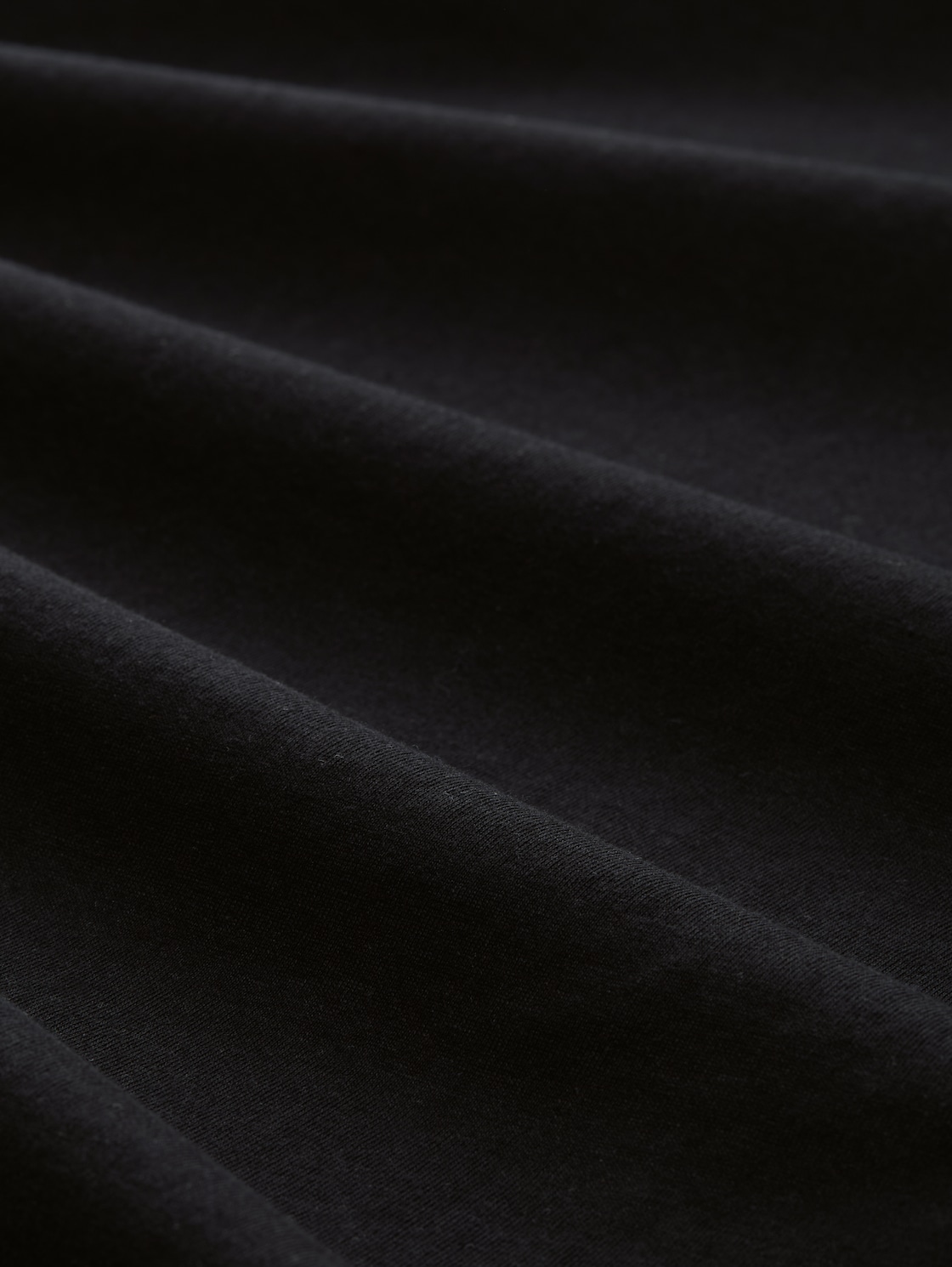 T-Shirt mit Print - deep black - Material-Ansicht