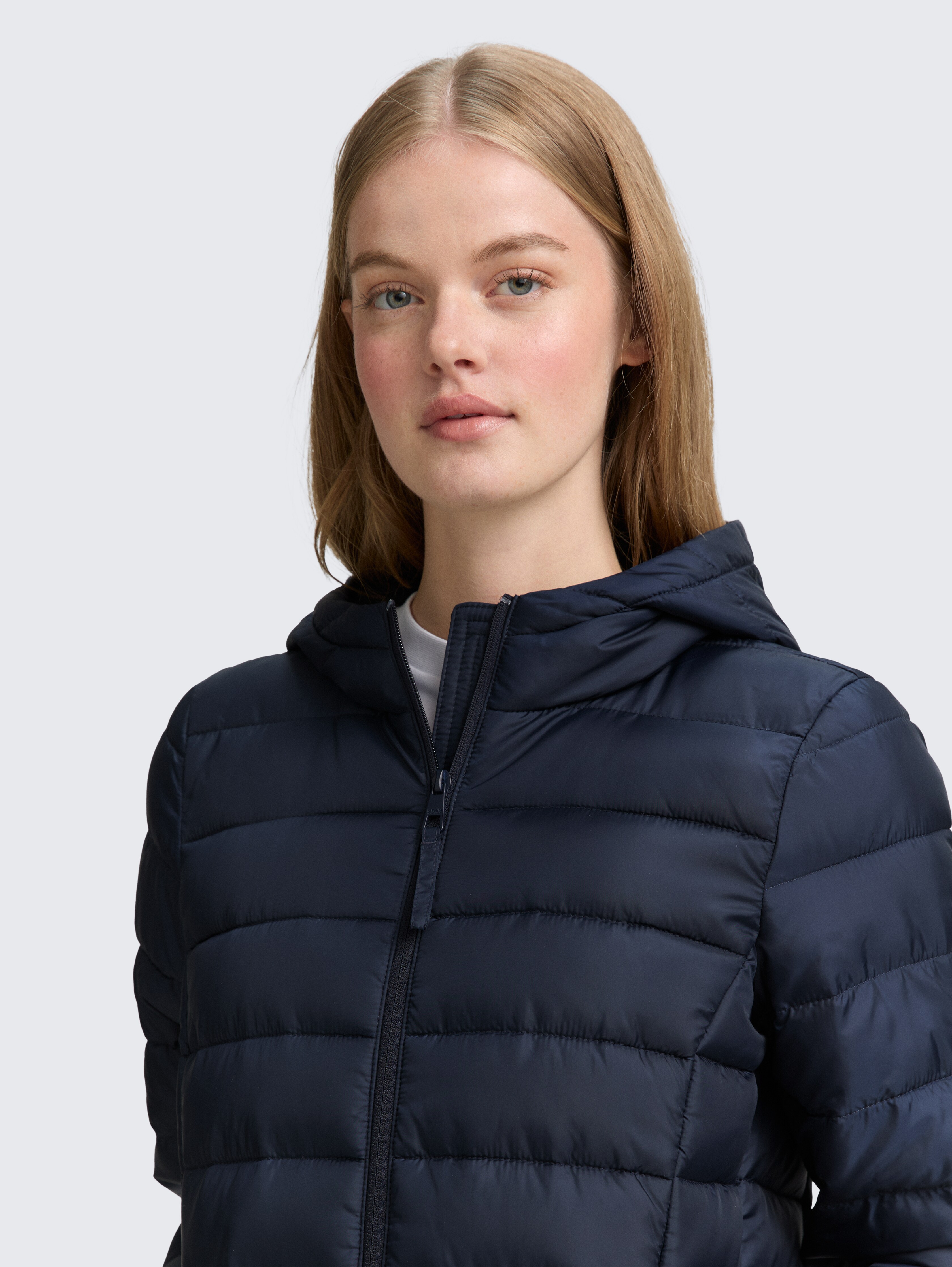 Lightweight quilted coat with hood in blue by Tom Tailor