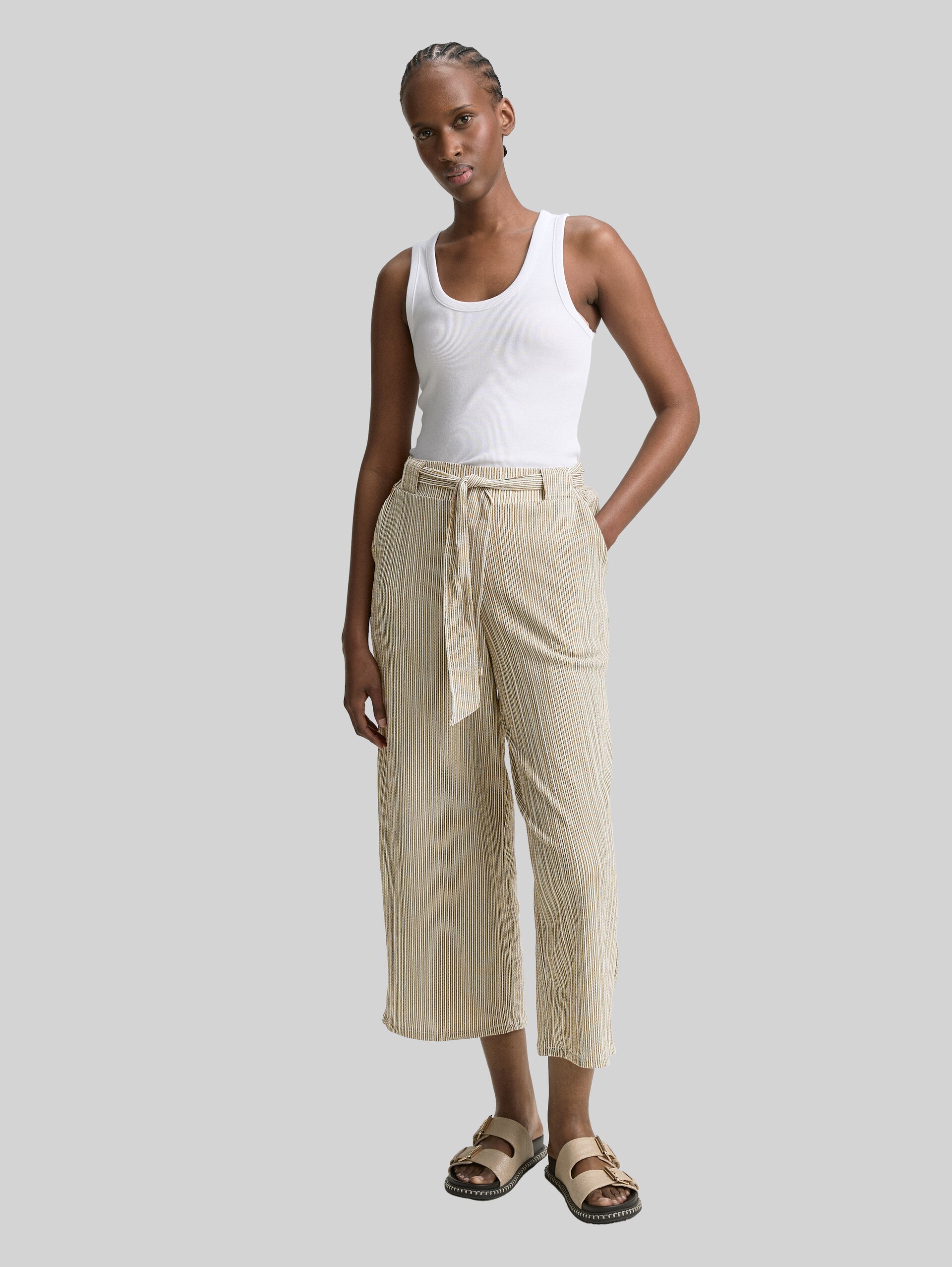 High waist culotte trousers with tie belt - vertical green white stripe - Model front view