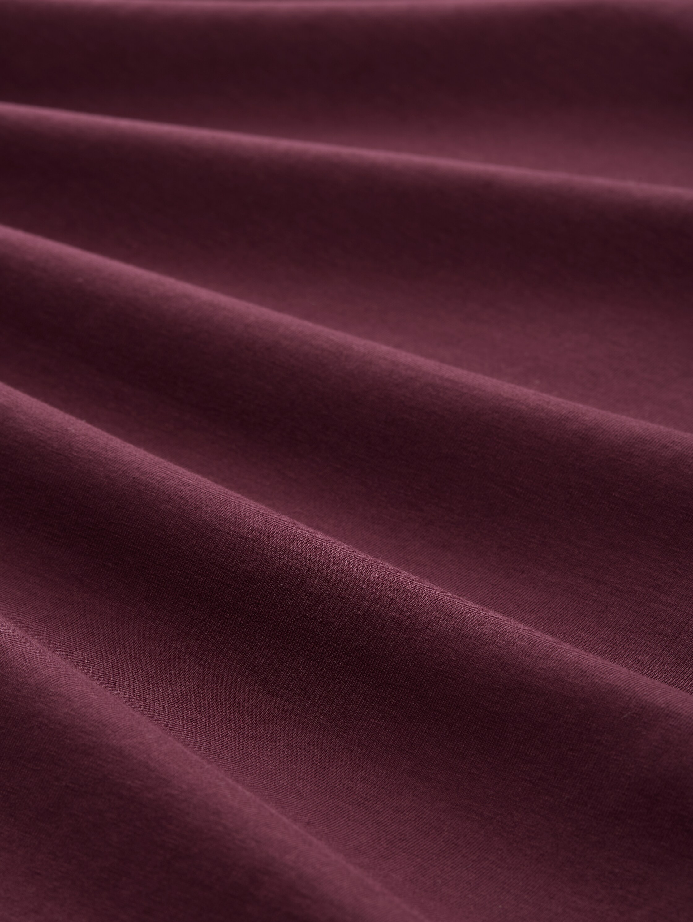 T-shirt met print - bordeaux red - Materiaalweergave