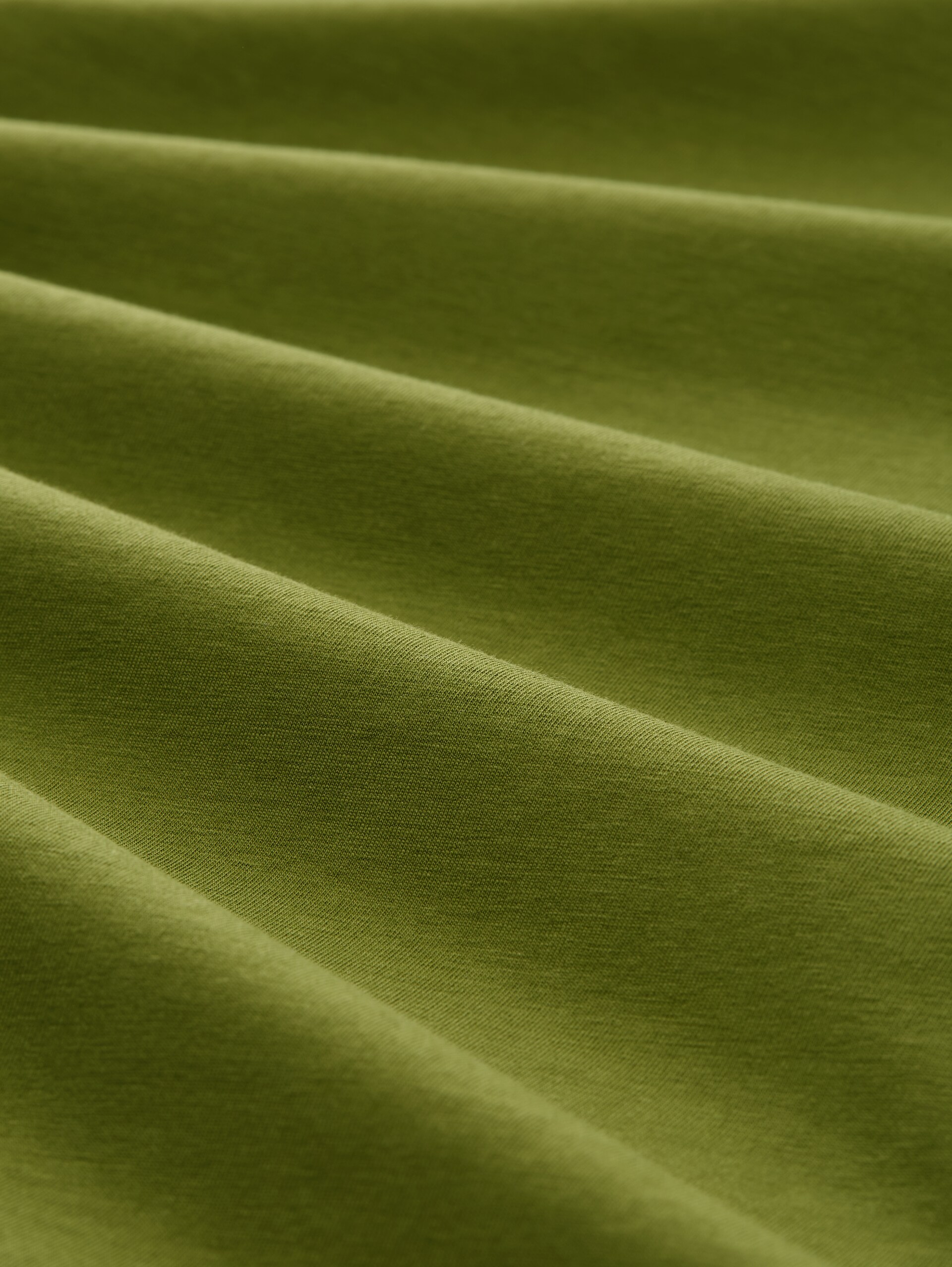 T-Shirt mit Print - deep ivy green - Material-Ansicht