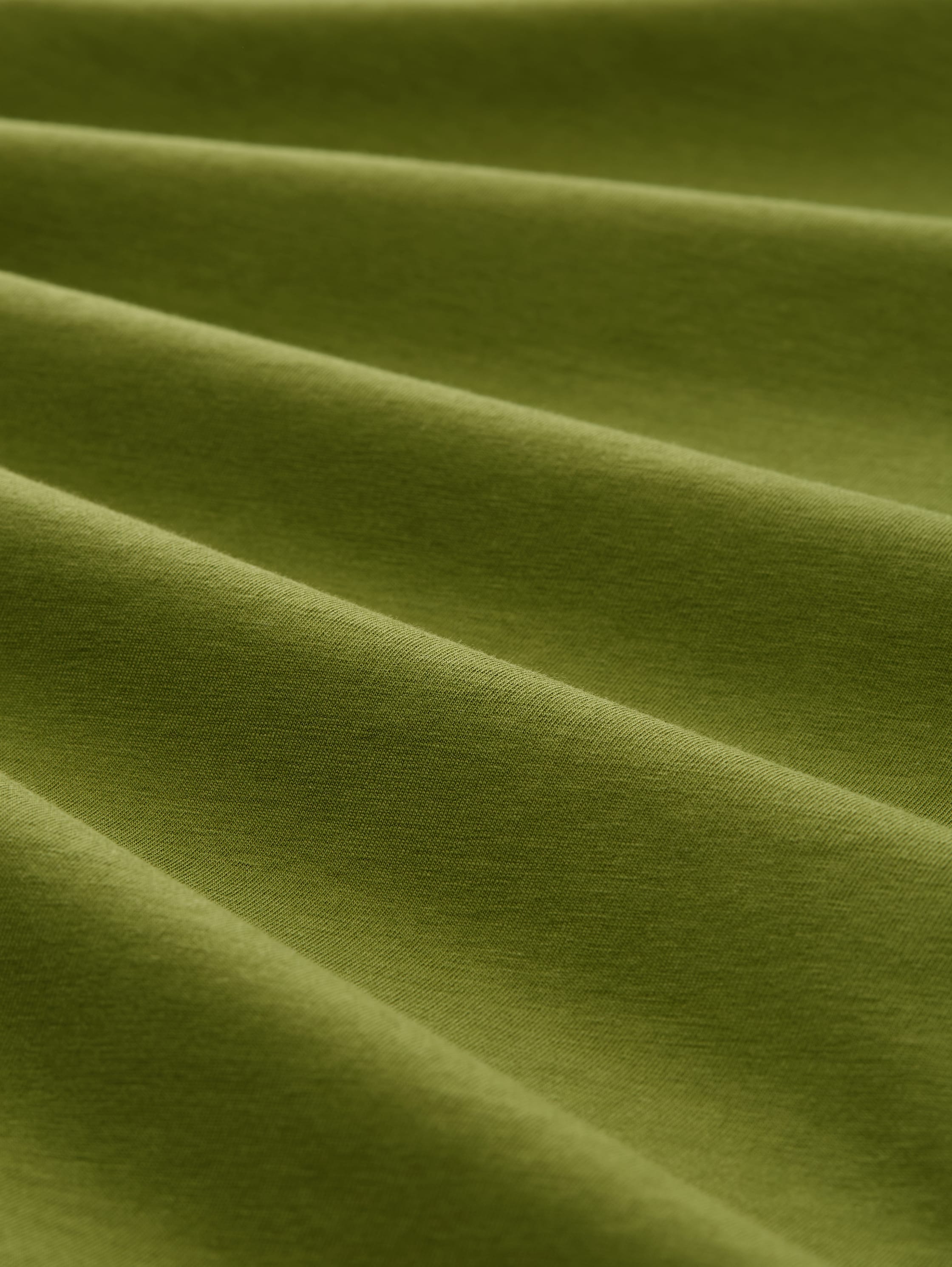 T-Shirt mit Print - deep ivy green - Material-Ansicht