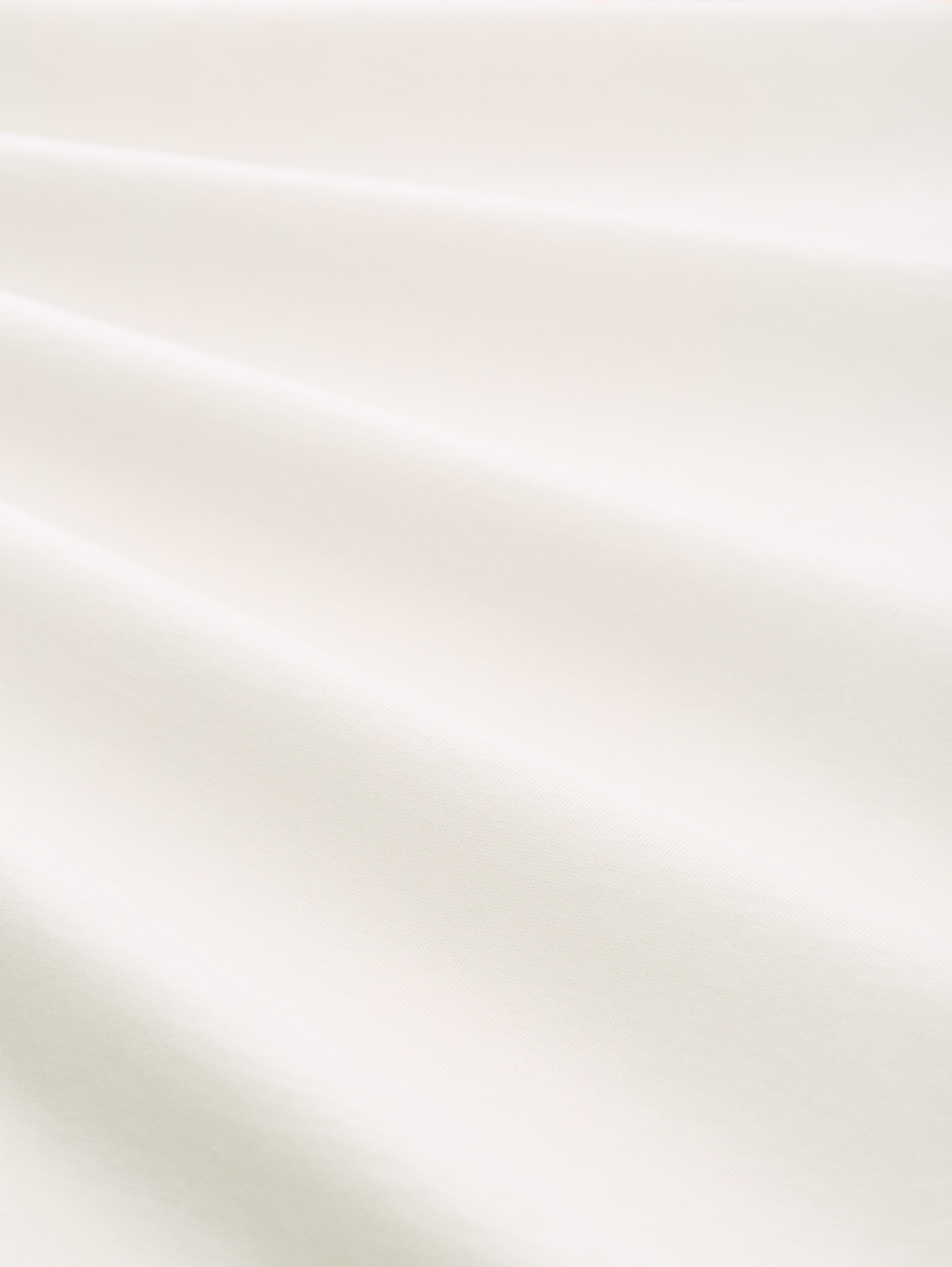 T-Shirt mit Print - Gardenia White - Material-Ansicht