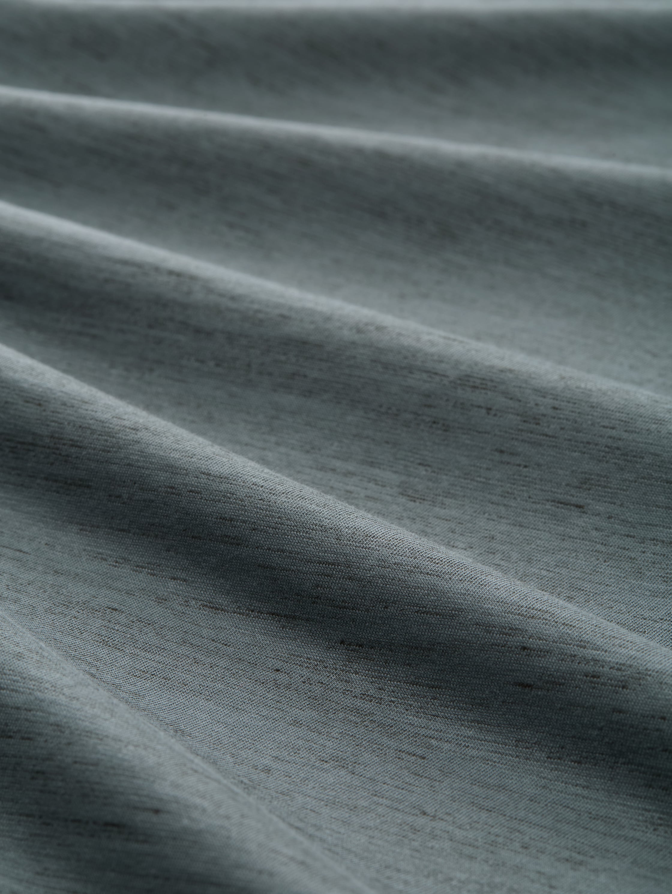 T-Shirt mit Print - washed jasper green - Material-Ansicht