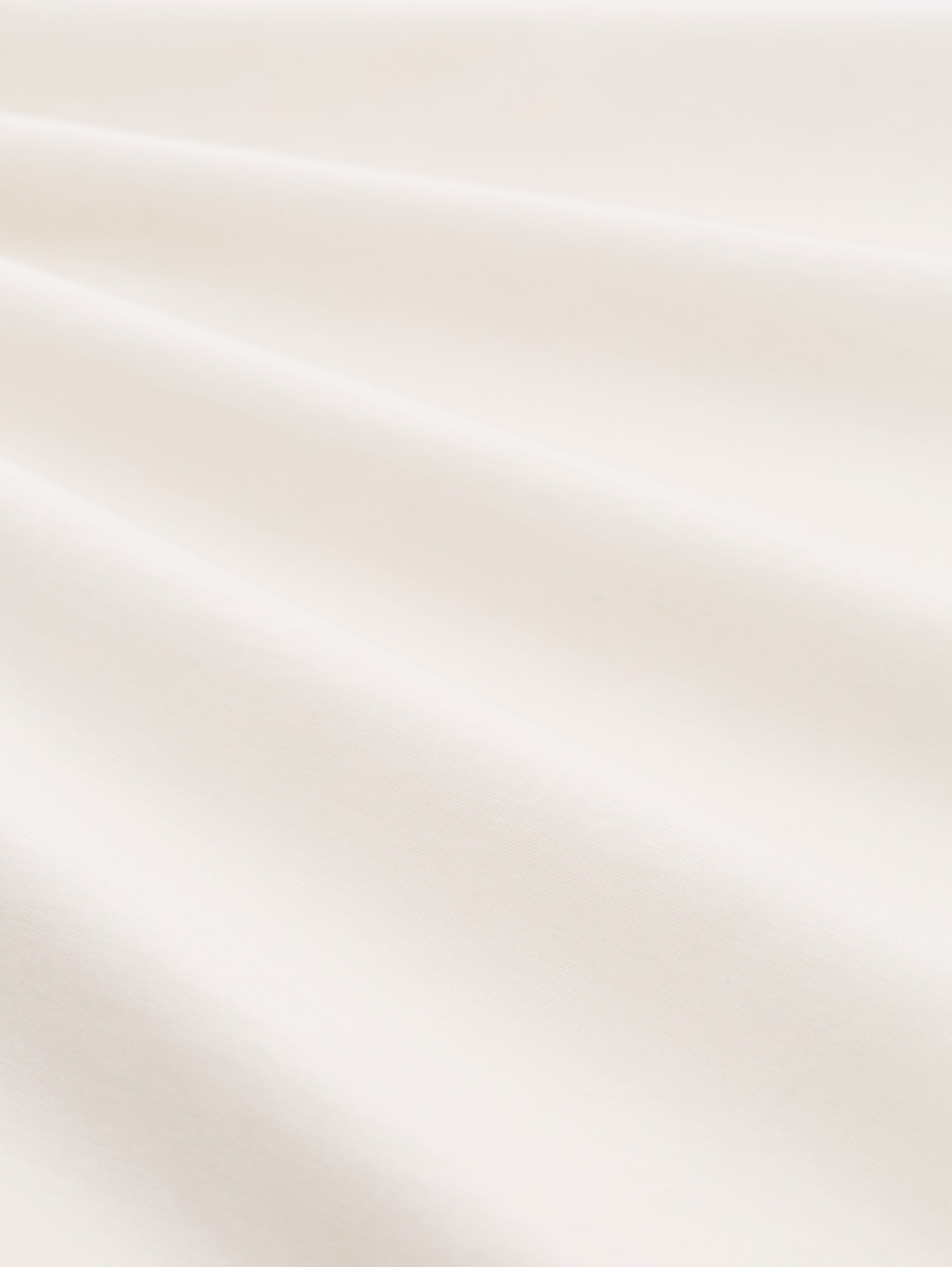 T-Shirt mit Print - Gardenia White - Material-Ansicht