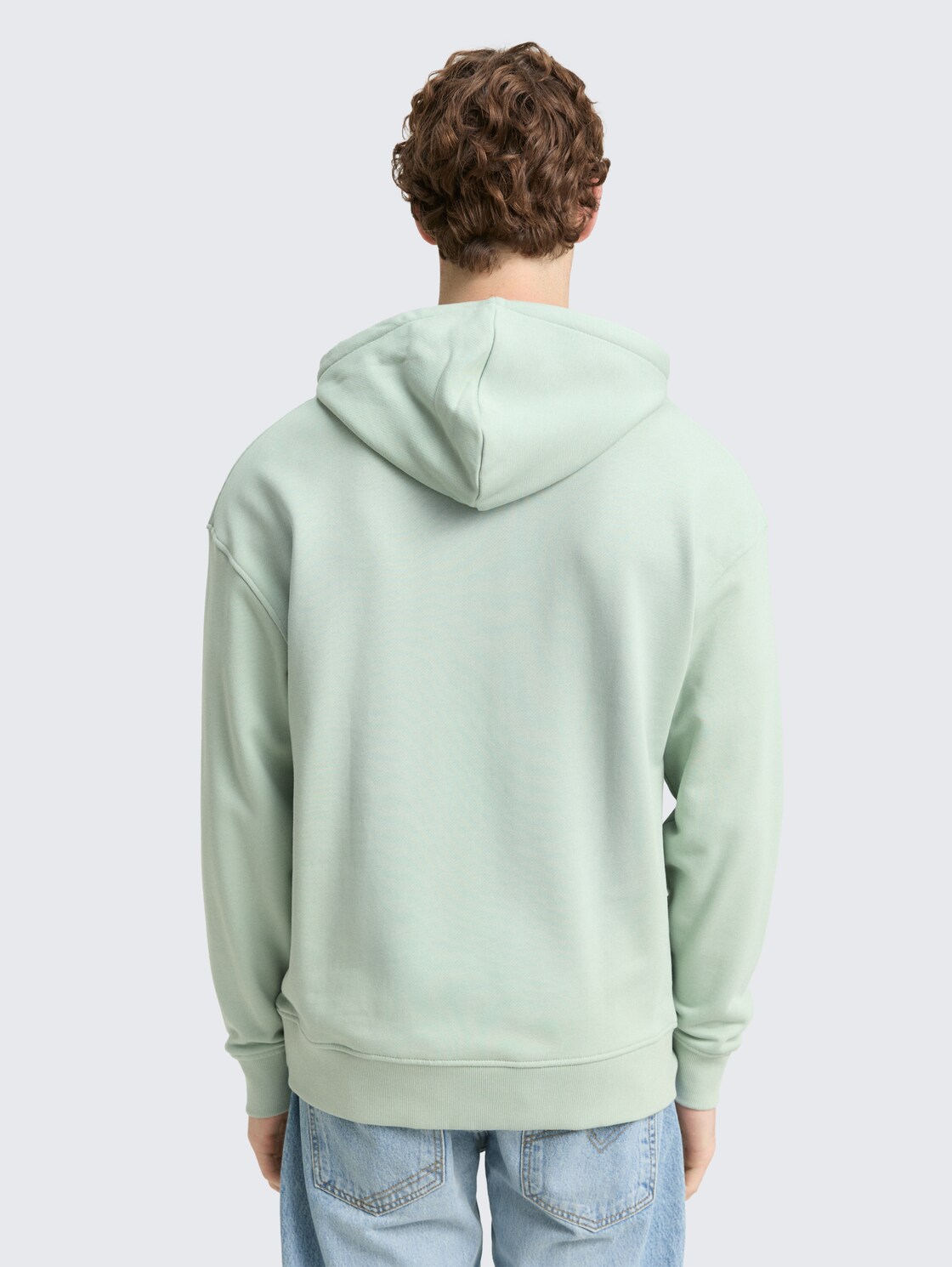 Relaxed Fit Hoodie Sweatshirt mit Print - Fresh Mint Green - Auschnitt Model-Rückansicht