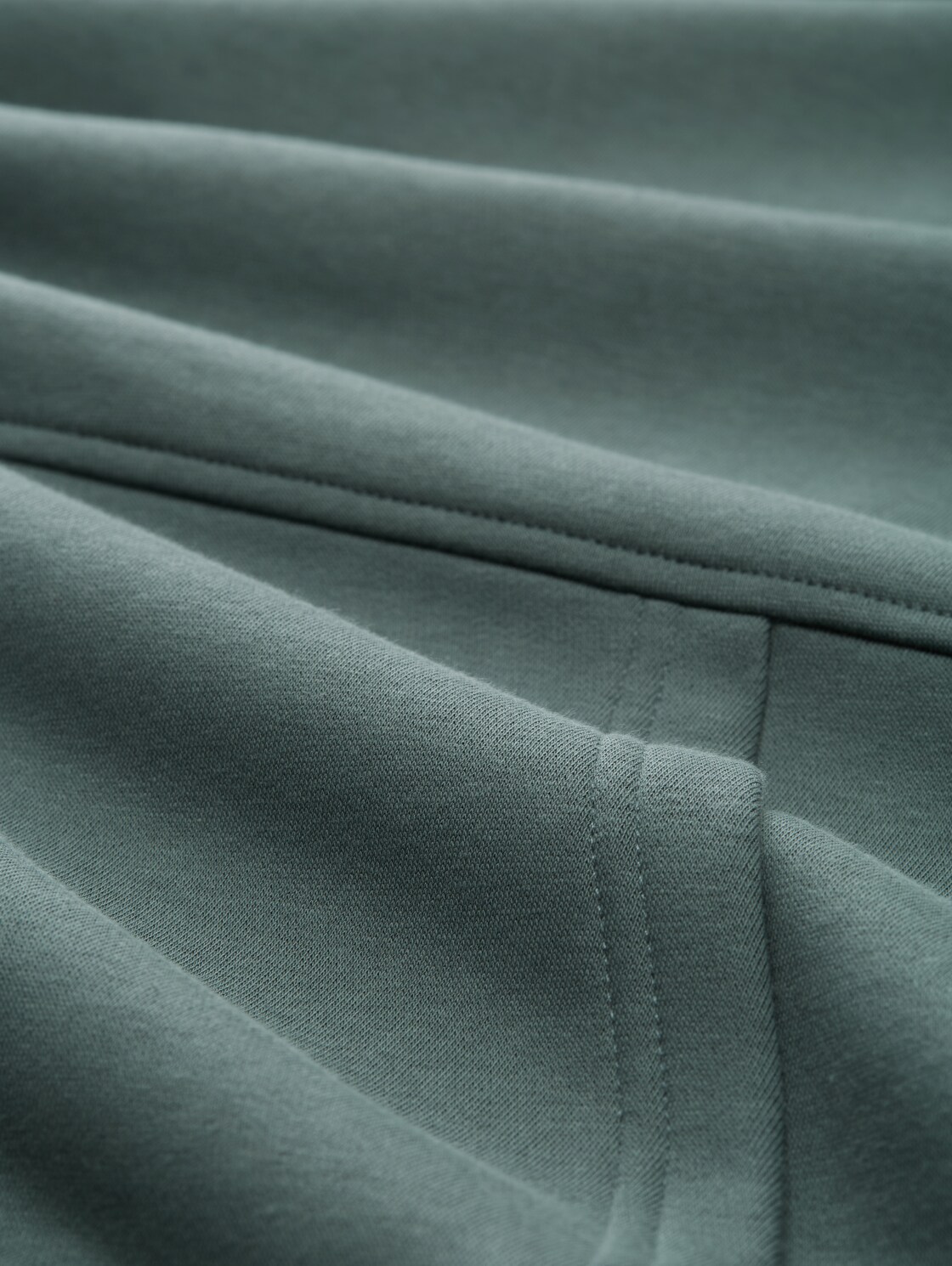 Relaxed Fit Hoodie Sweatshirt mit Rückenprint - washed jasper green - Material-Ansicht