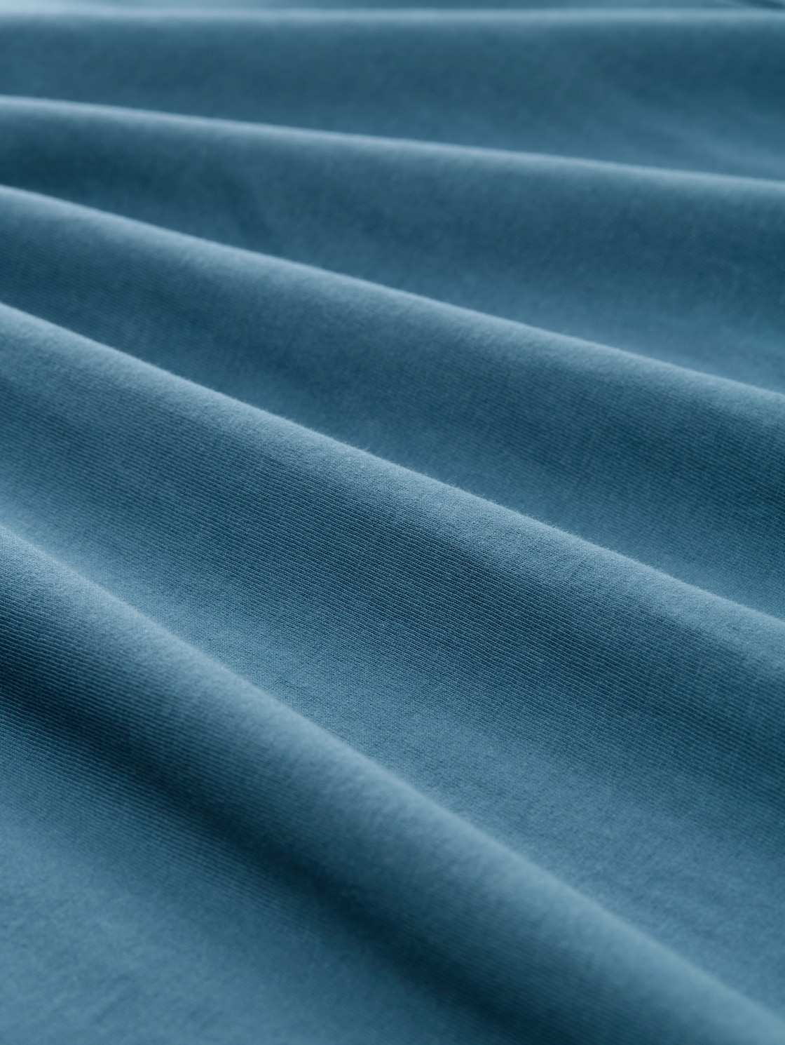 T-Shirt mit V-Ausschnitt - real teal blue - Material-Ansicht