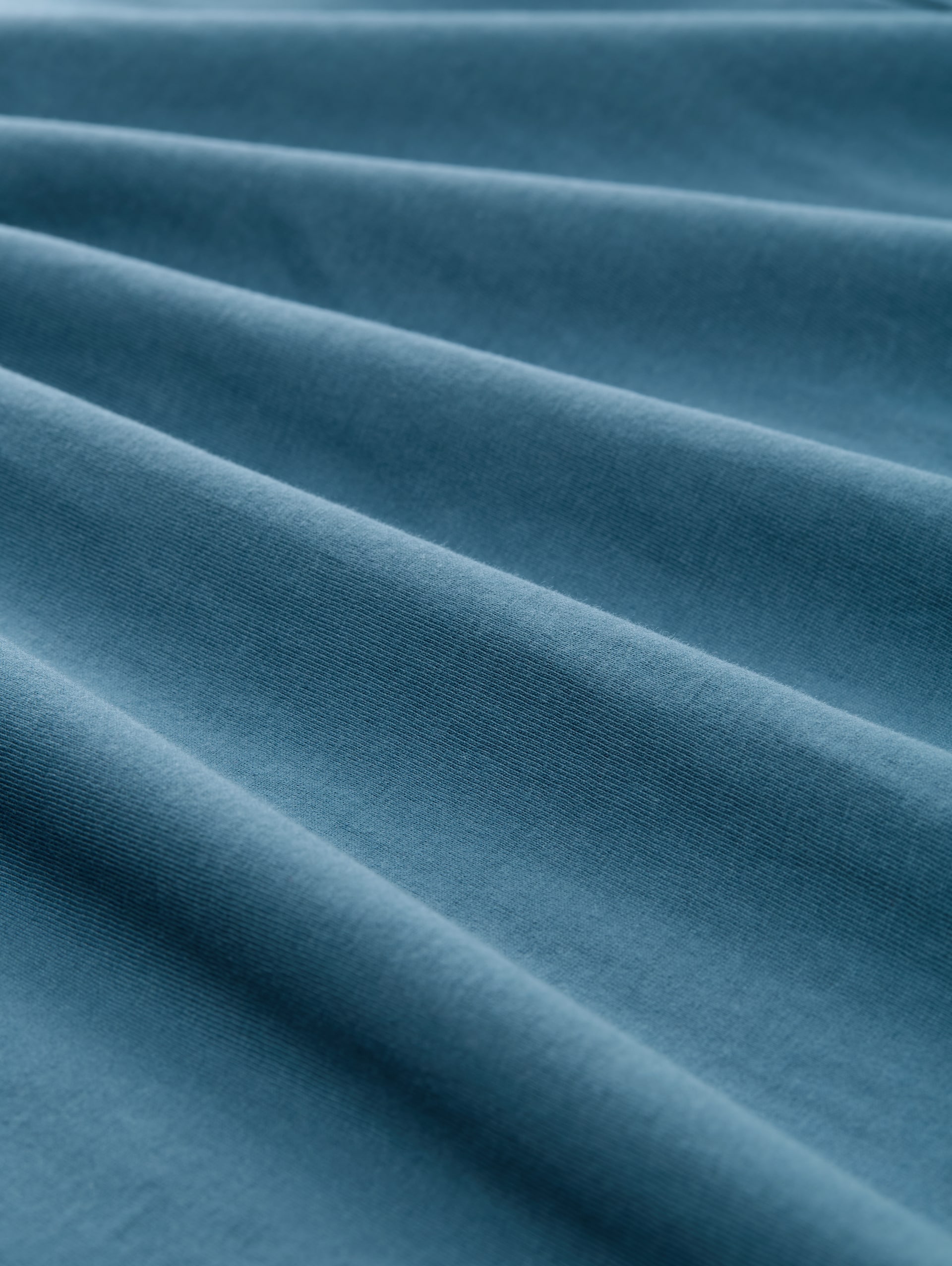 T-Shirt mit V-Ausschnitt - real teal blue - Material-Ansicht