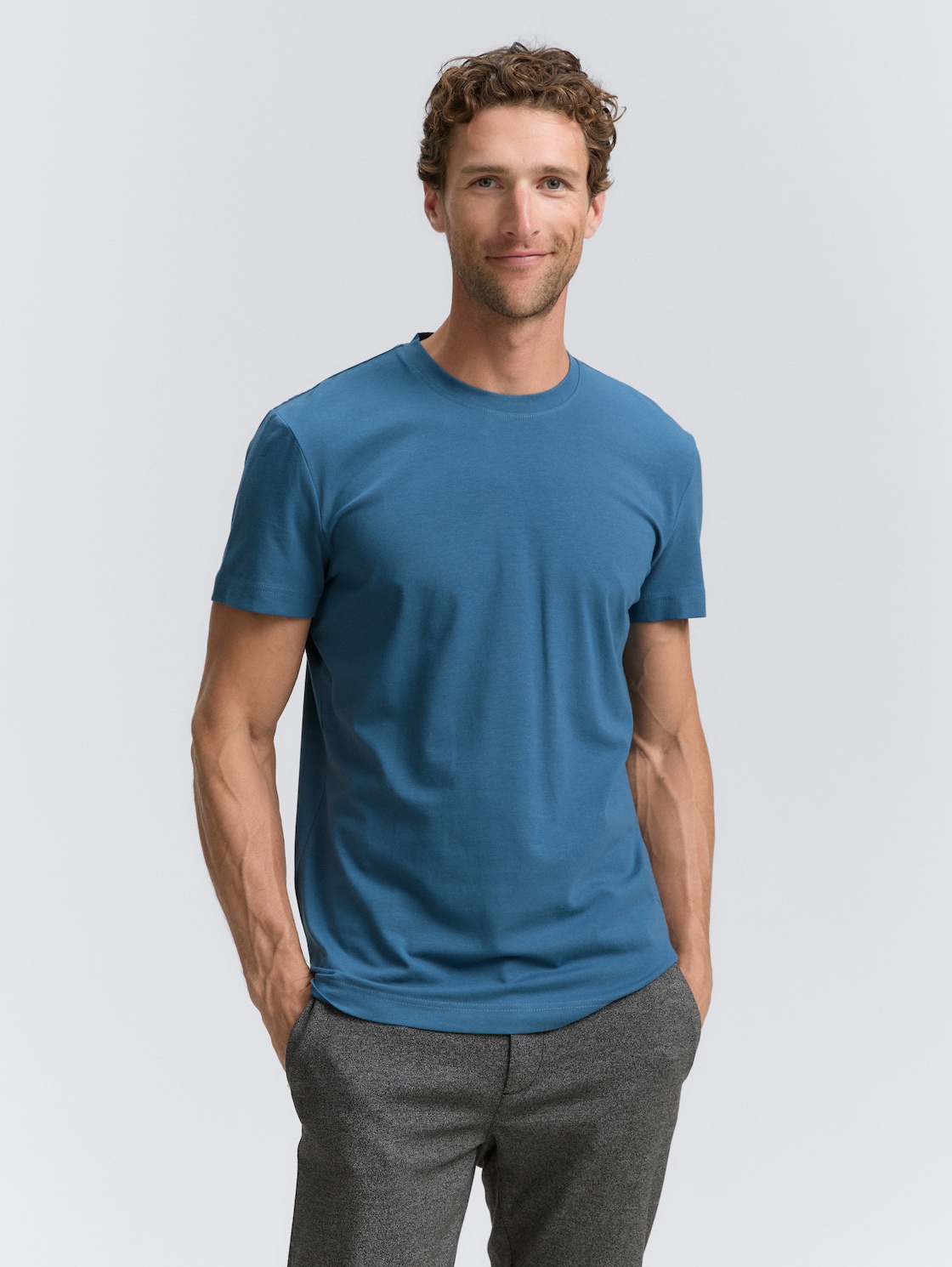 Slim Fit T-Shirt mit Stretch - real teal blue - Ausschnitt Model-Vorderansicht