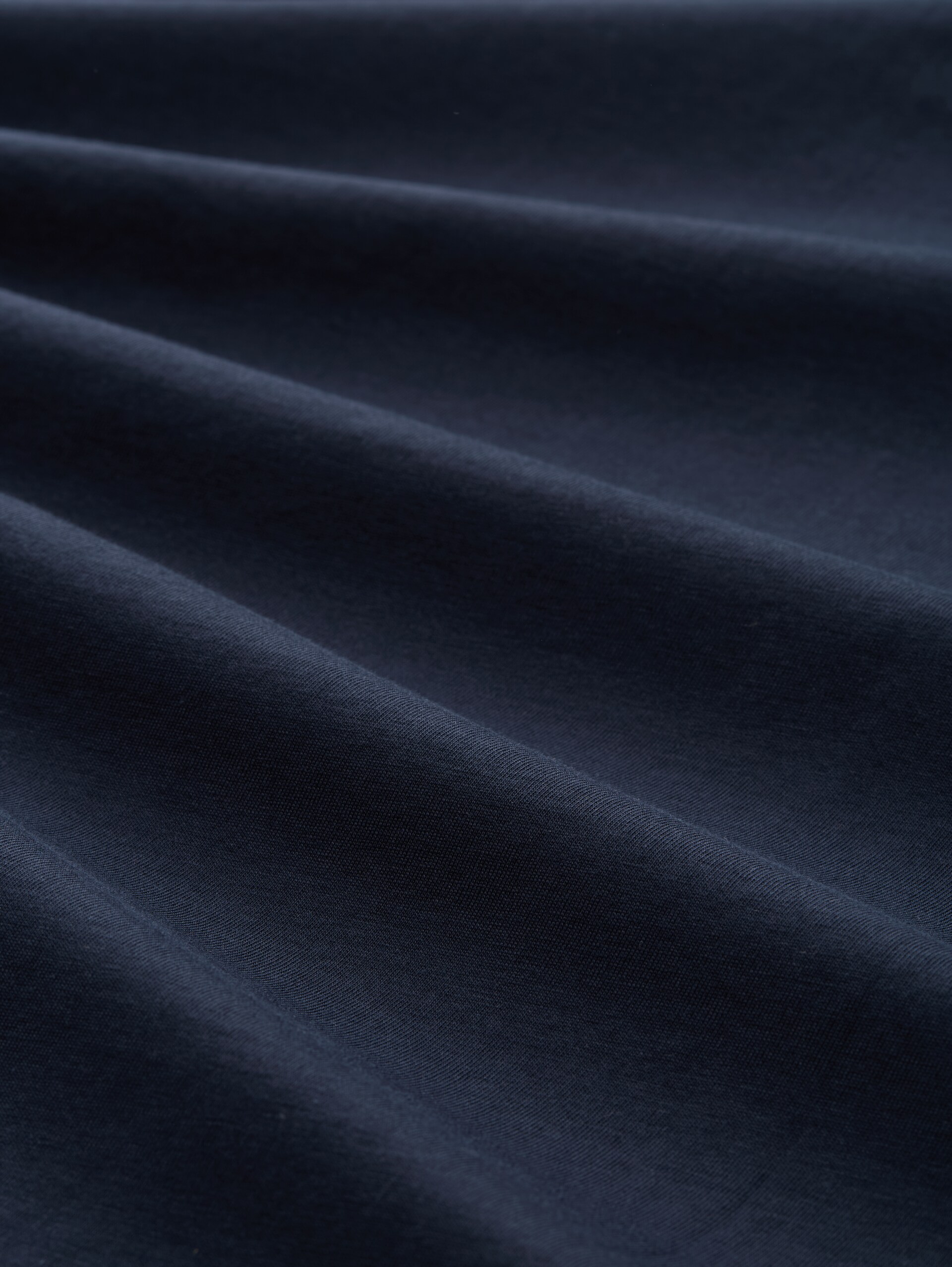 T-Shirt mit Print - sky captain blue - Material-Ansicht