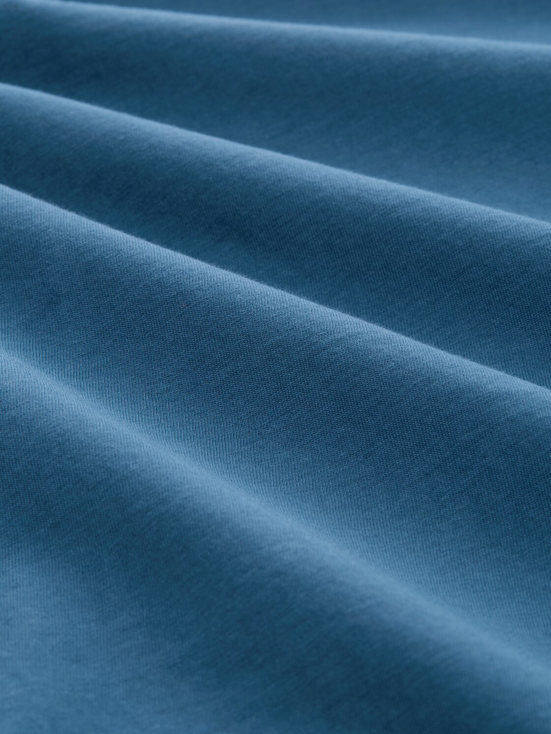 T-Shirt mit Print - real teal blue - Material-Ansicht