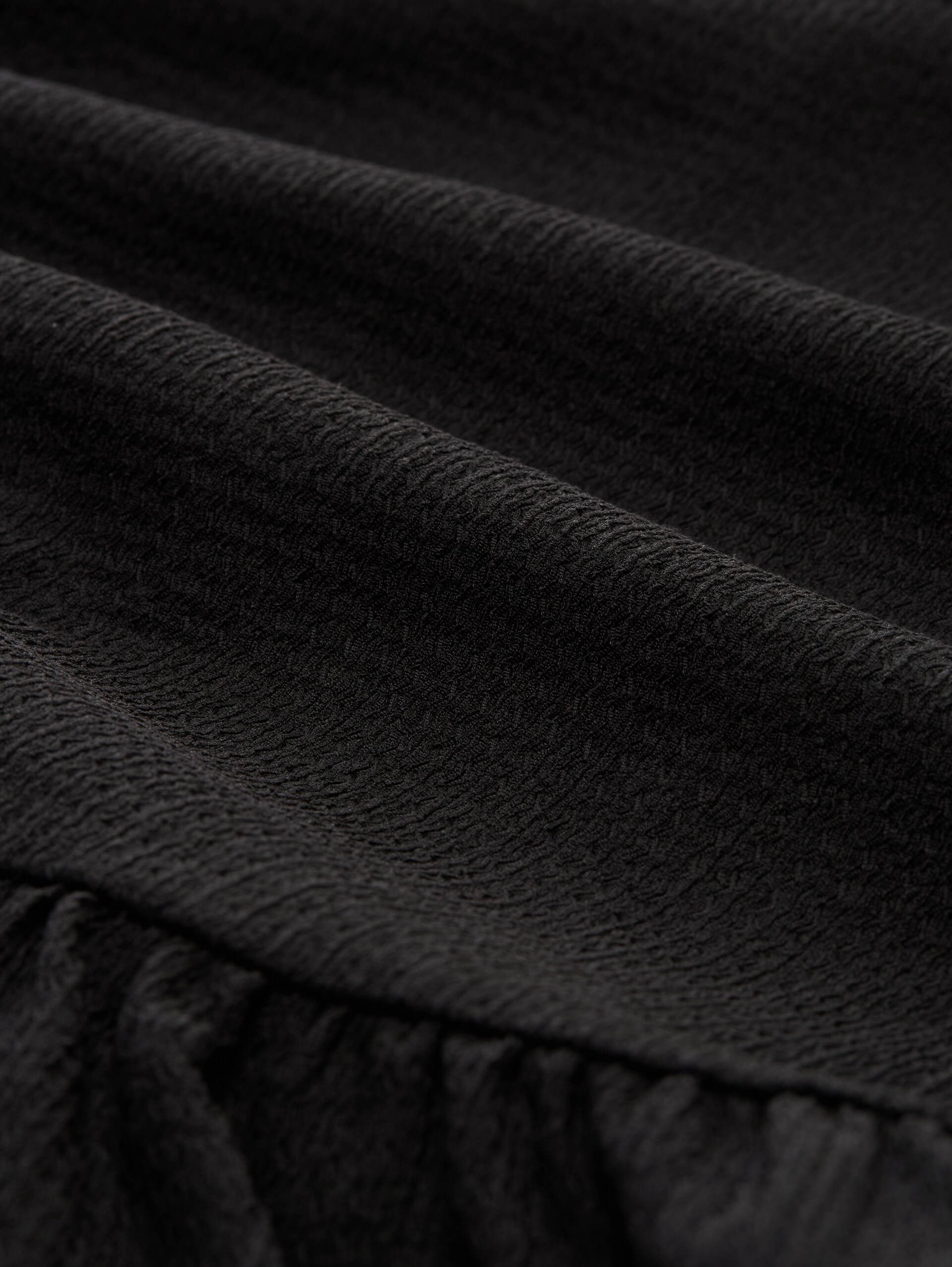 Jacquard T-Shirt mit Peplum - deep black - Material-Ansicht