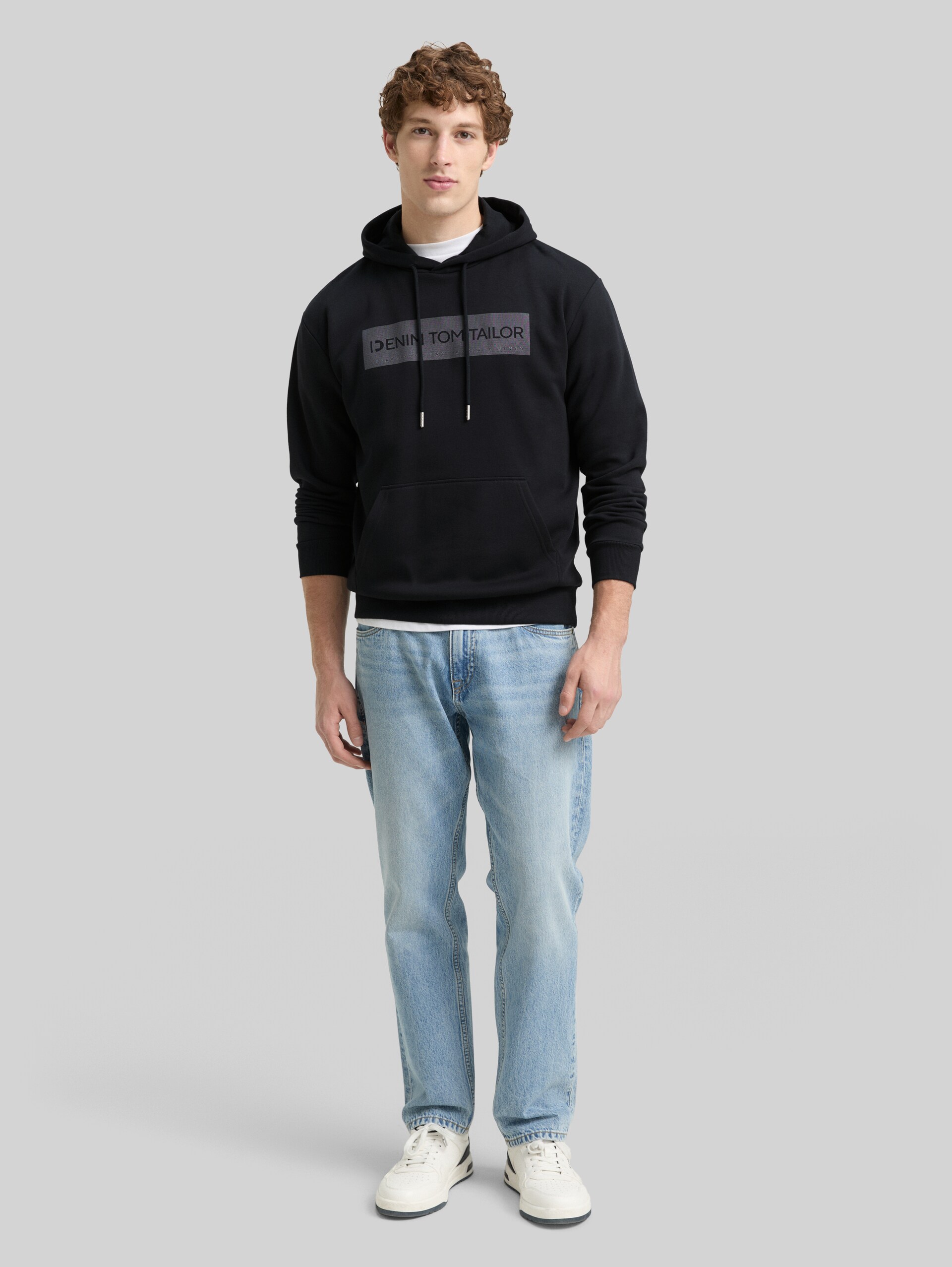 Hoodie with a print - Night Watch Black - Model front view