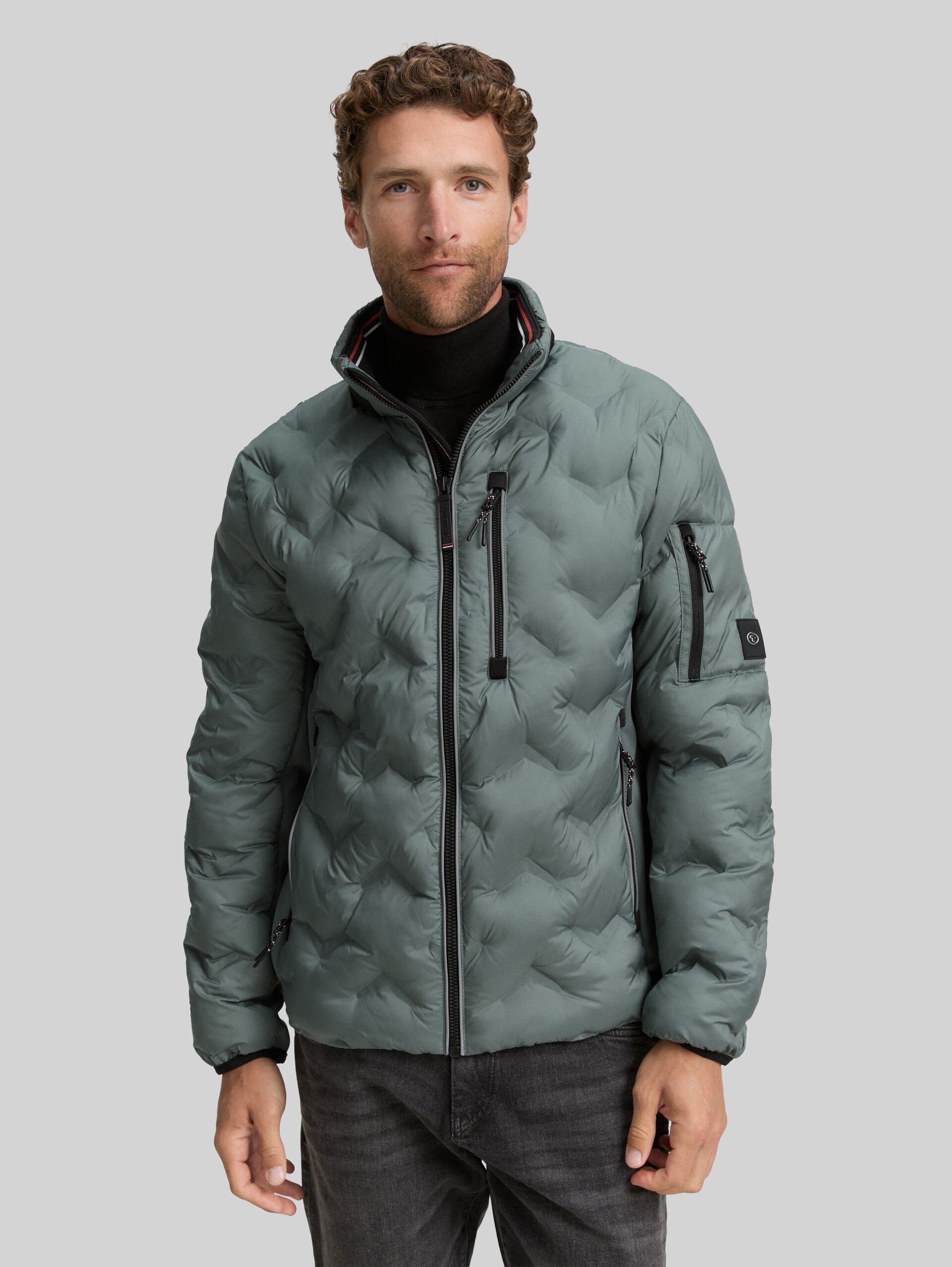 Hybrid quilted jacket with stowable hood - washed jasper green - Model front view