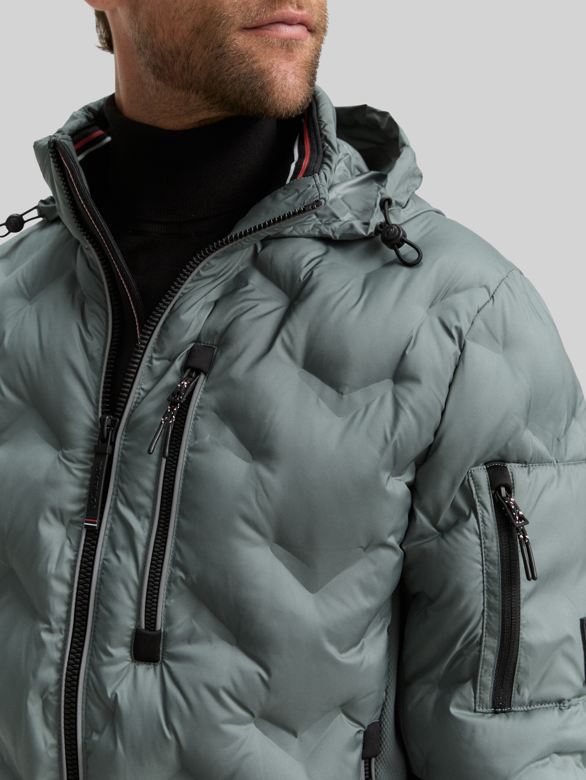 Hybrid quilted jacket with stowable hood - washed jasper green - Detail model view