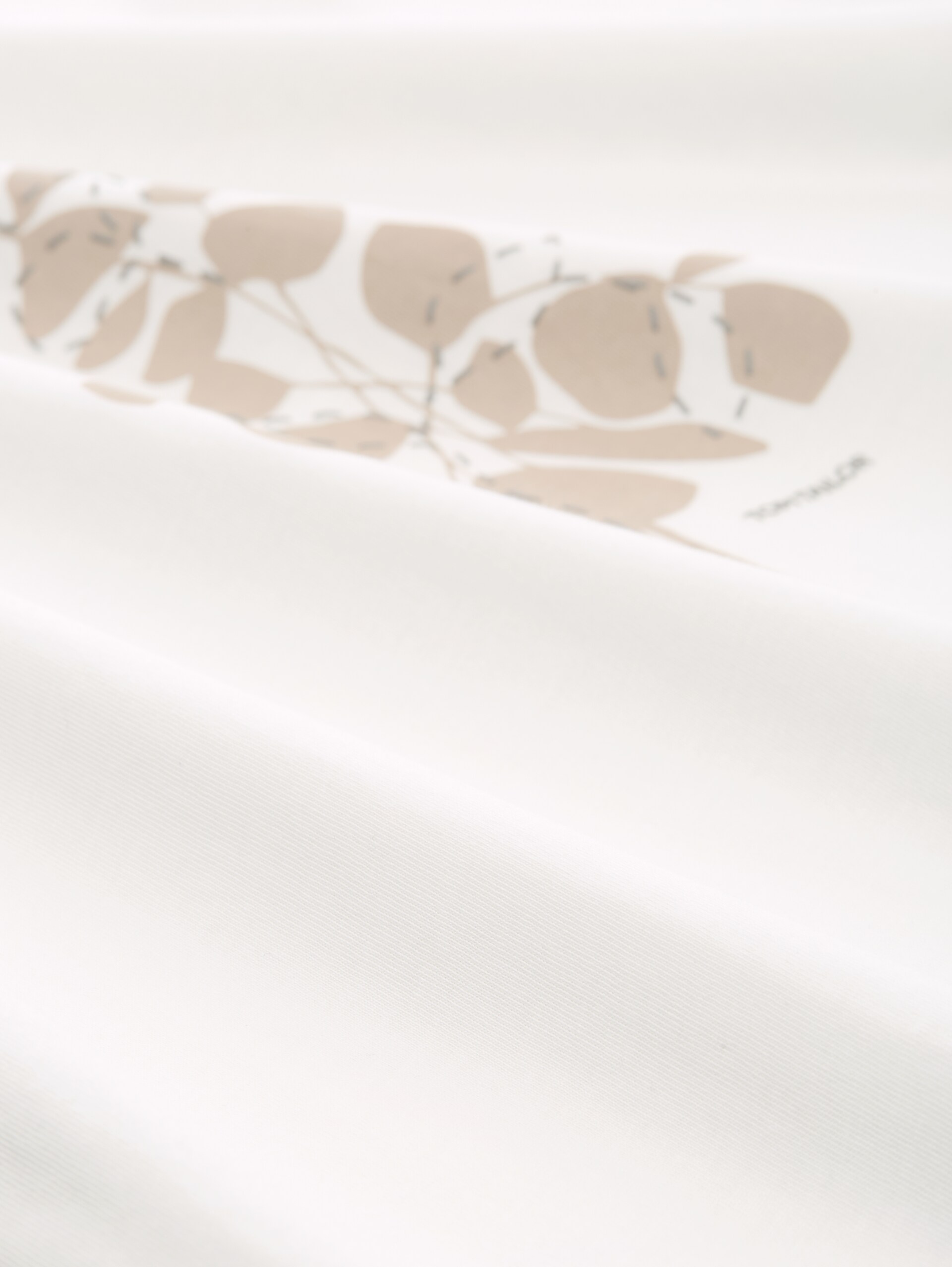 T-Shirt mit Print - Whisper White - Material-Ansicht