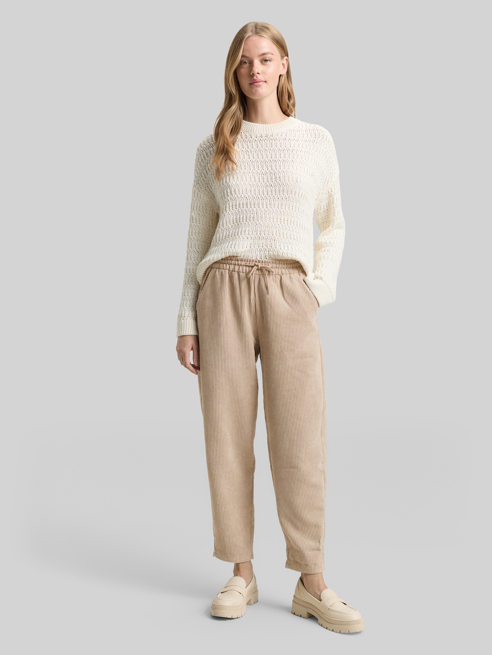 Corduroy trousers with drawstring - tan brown - Model front view