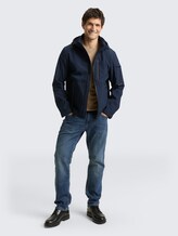 Softshell Jacke mit Kapuze - sky captain blue - seitliche Model-Ansicht