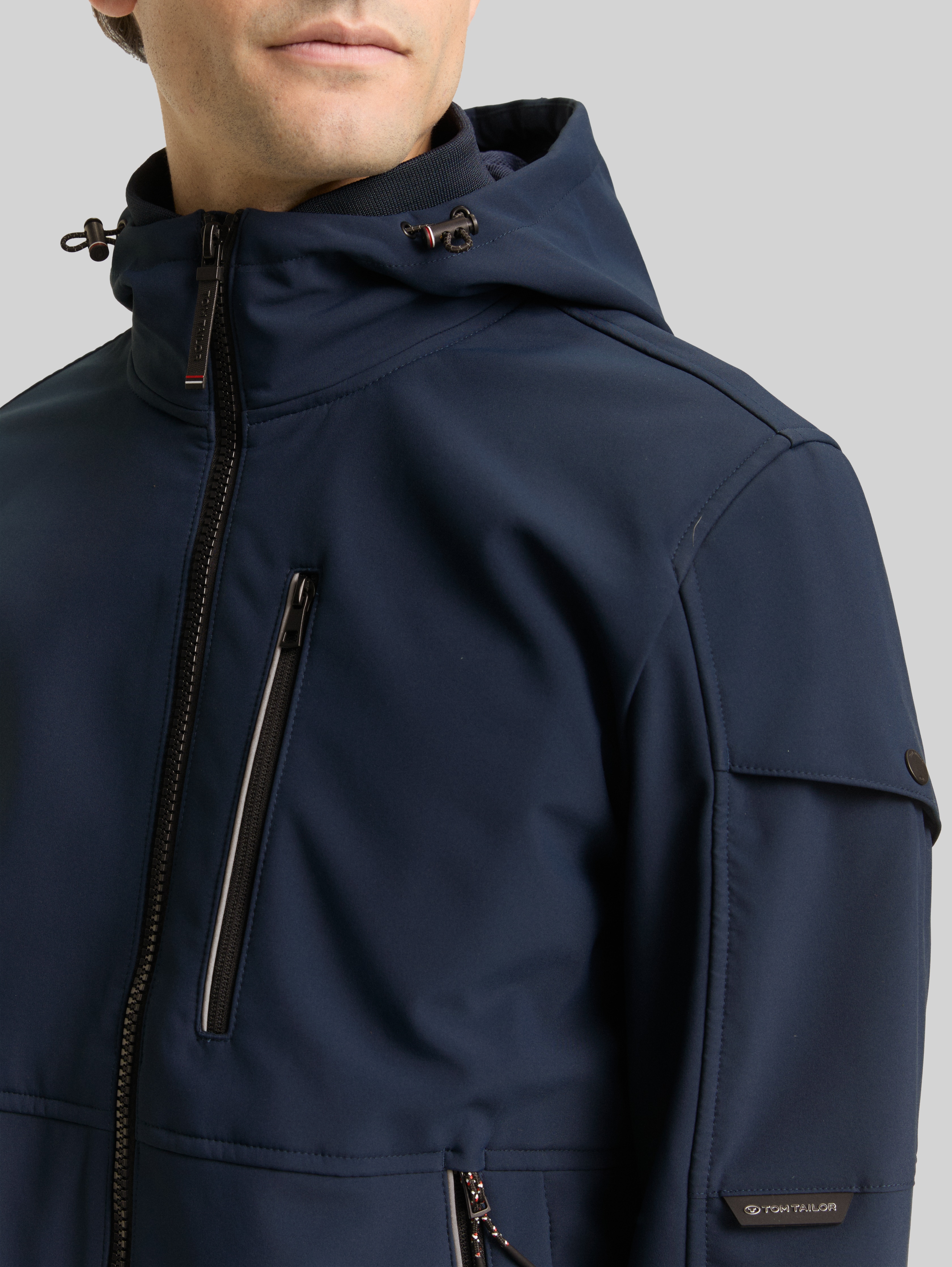 Softshell jacket with hood in blue by Tom Tailor