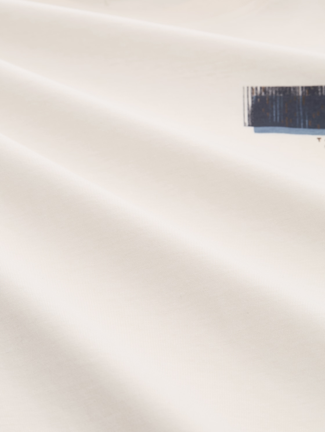 T-Shirt mit Print - Gardenia White - Material-Ansicht