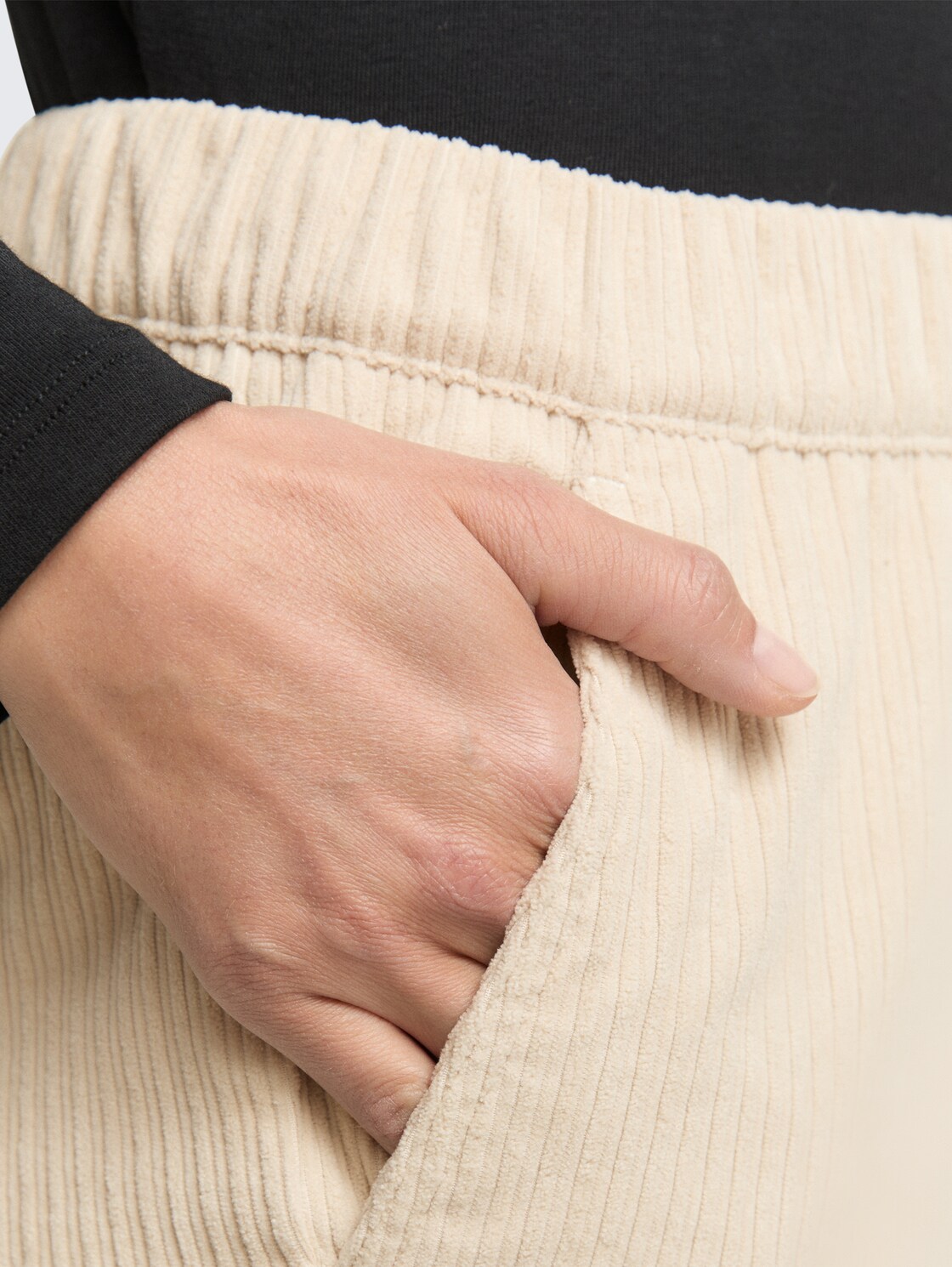 Loose slim corduroy trousers - sand stone beige - Detail model view