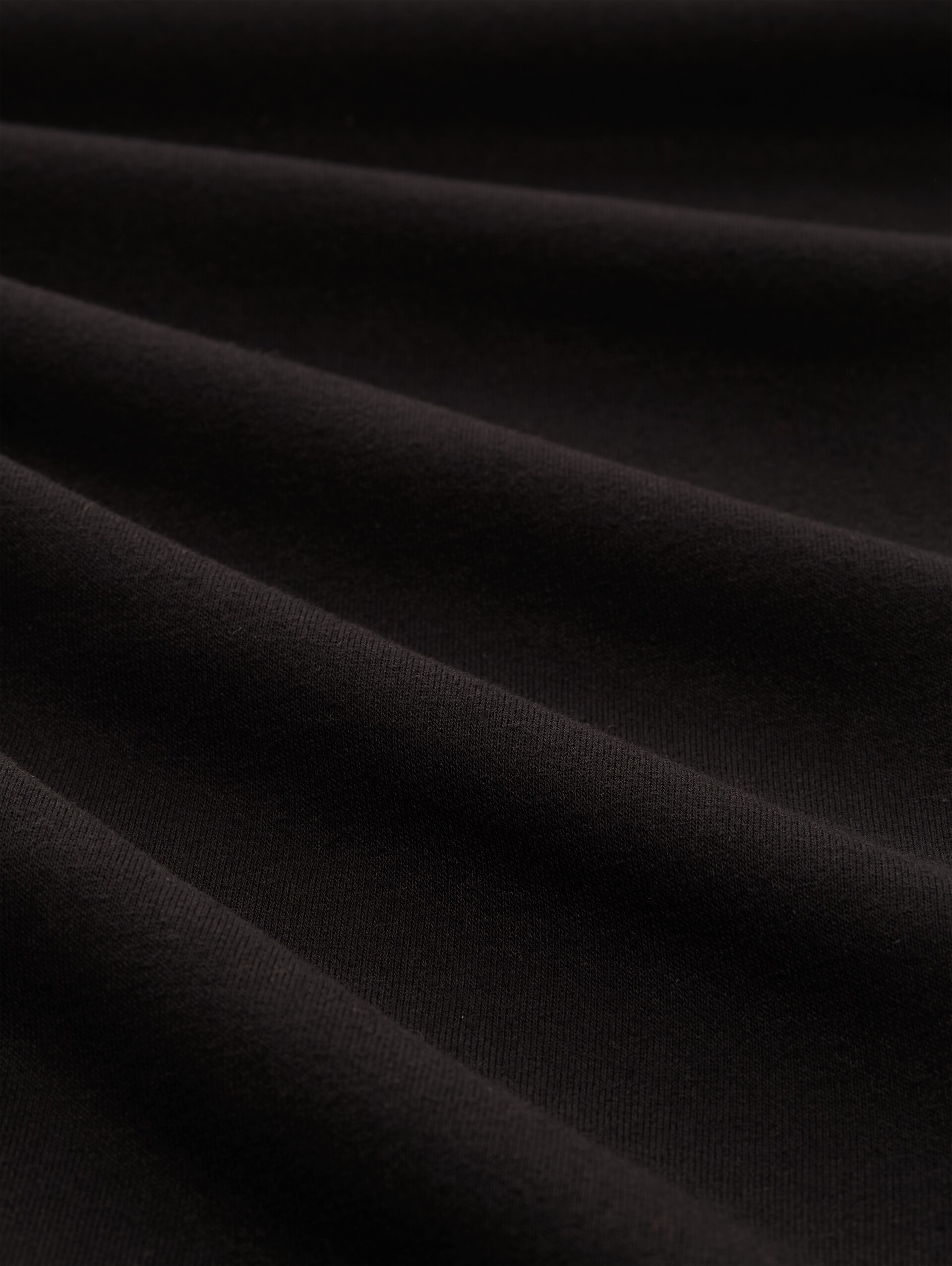 Jogginghose mit Glitzer-Stickerei - deep black - Material-Ansicht