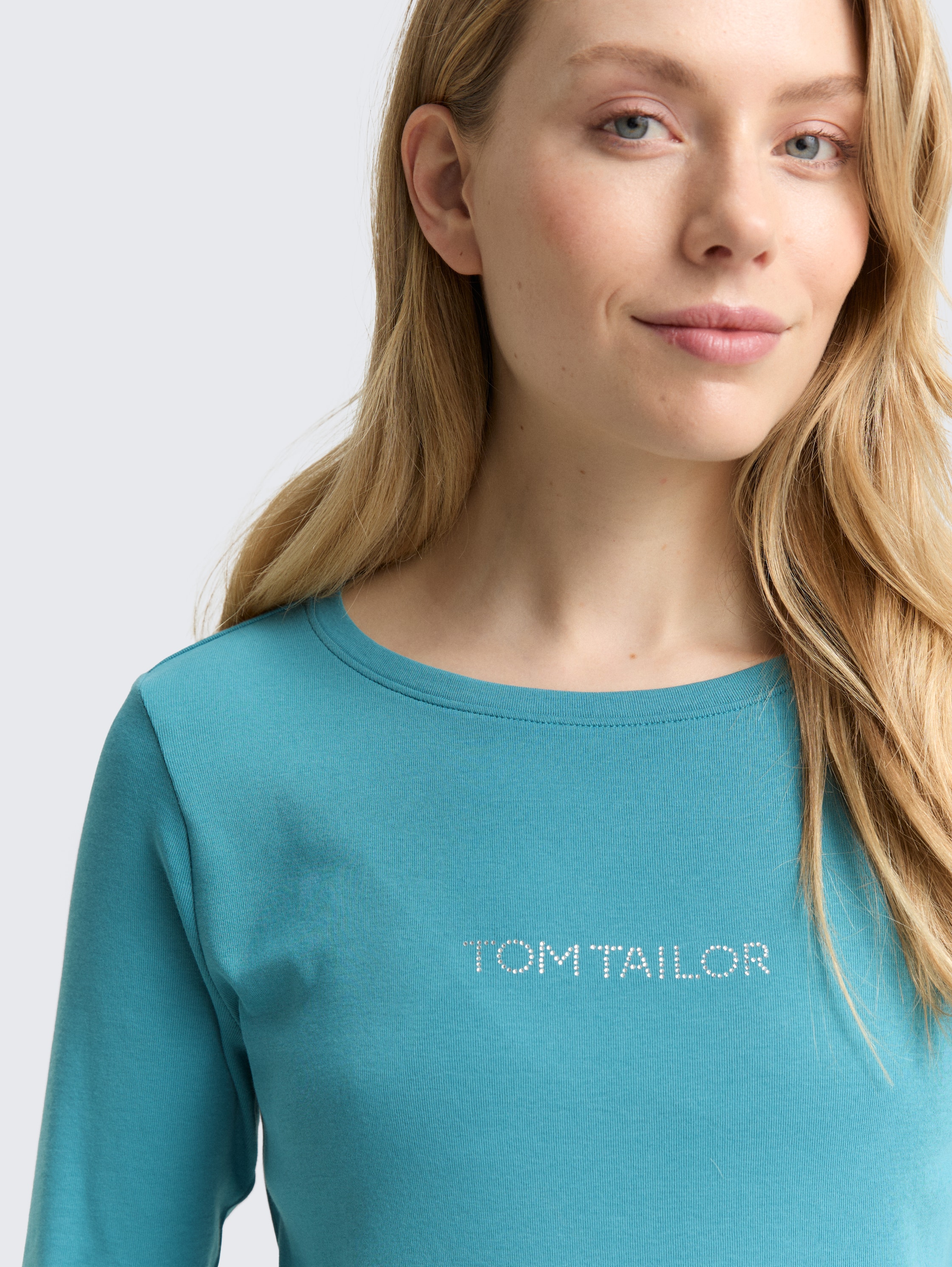 Slim Fit Langarmshirt mit Glitzer-Logo - tropical_teal - 