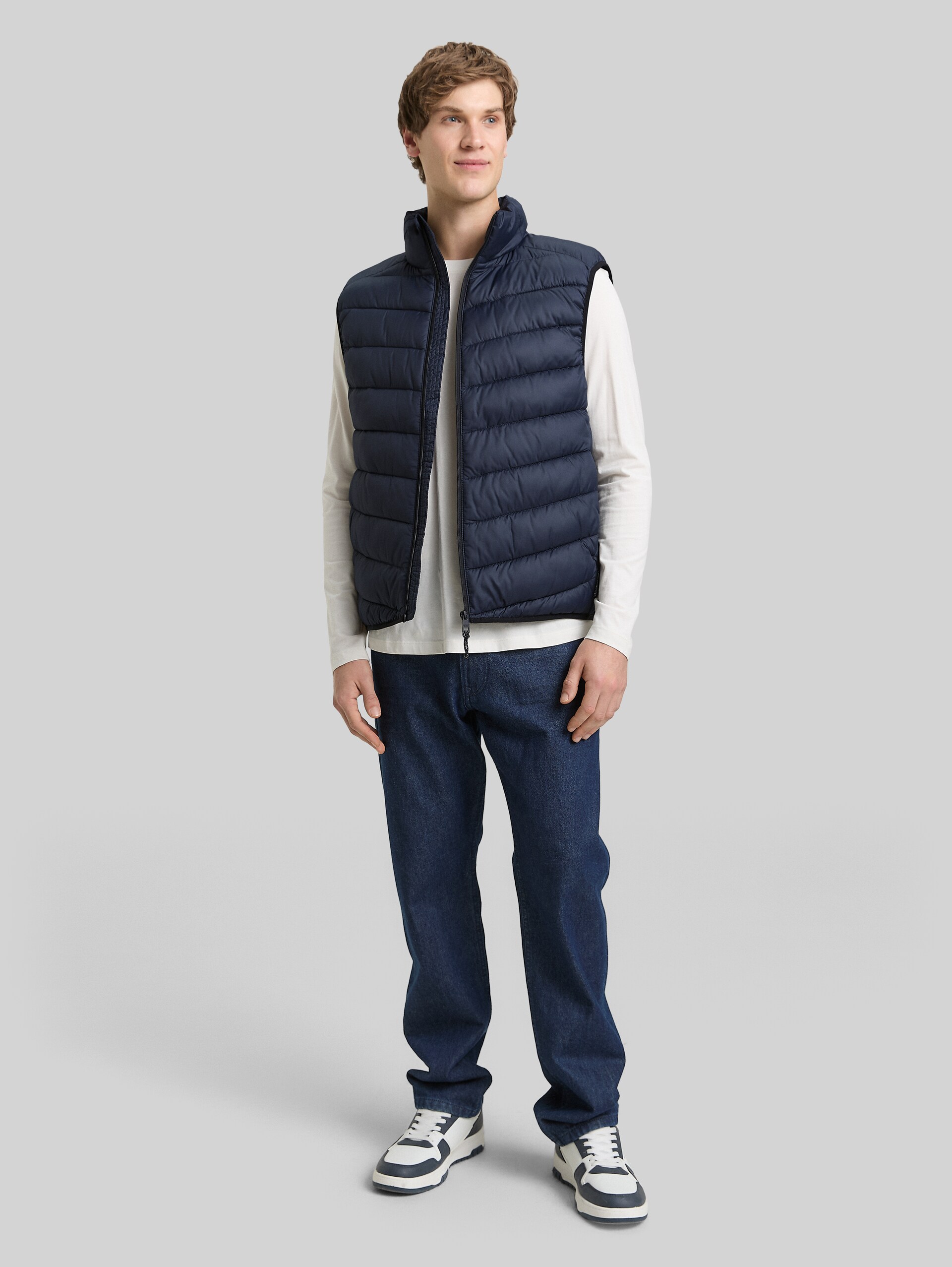Lightweight quilted waistcoat with stand-up collar - sky captain blue - side model view