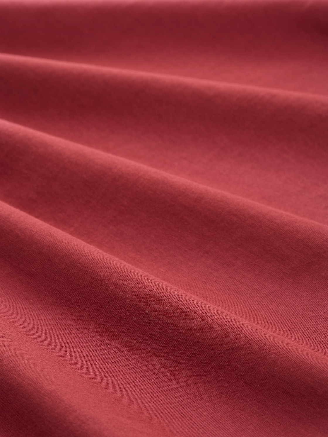 T-Shirt mit Foto-Print - burnt russet - Material-Ansicht