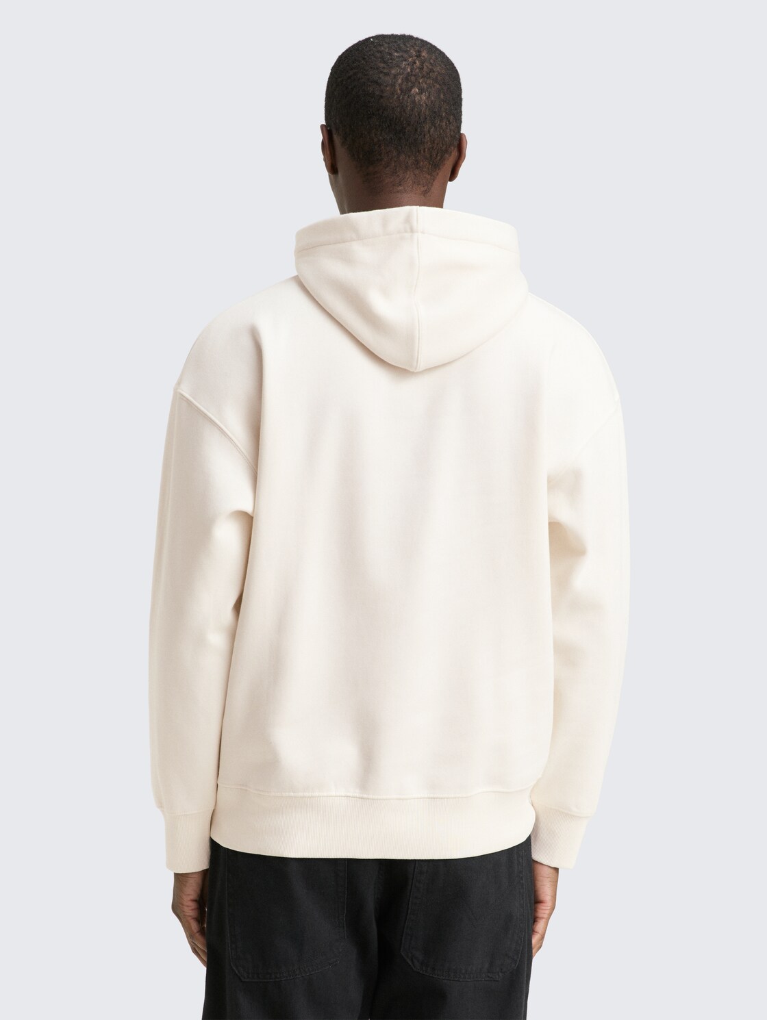 Relaxed Hoodie Sweatshirt mit Print - Wool White - Auschnitt Model-Rückansicht