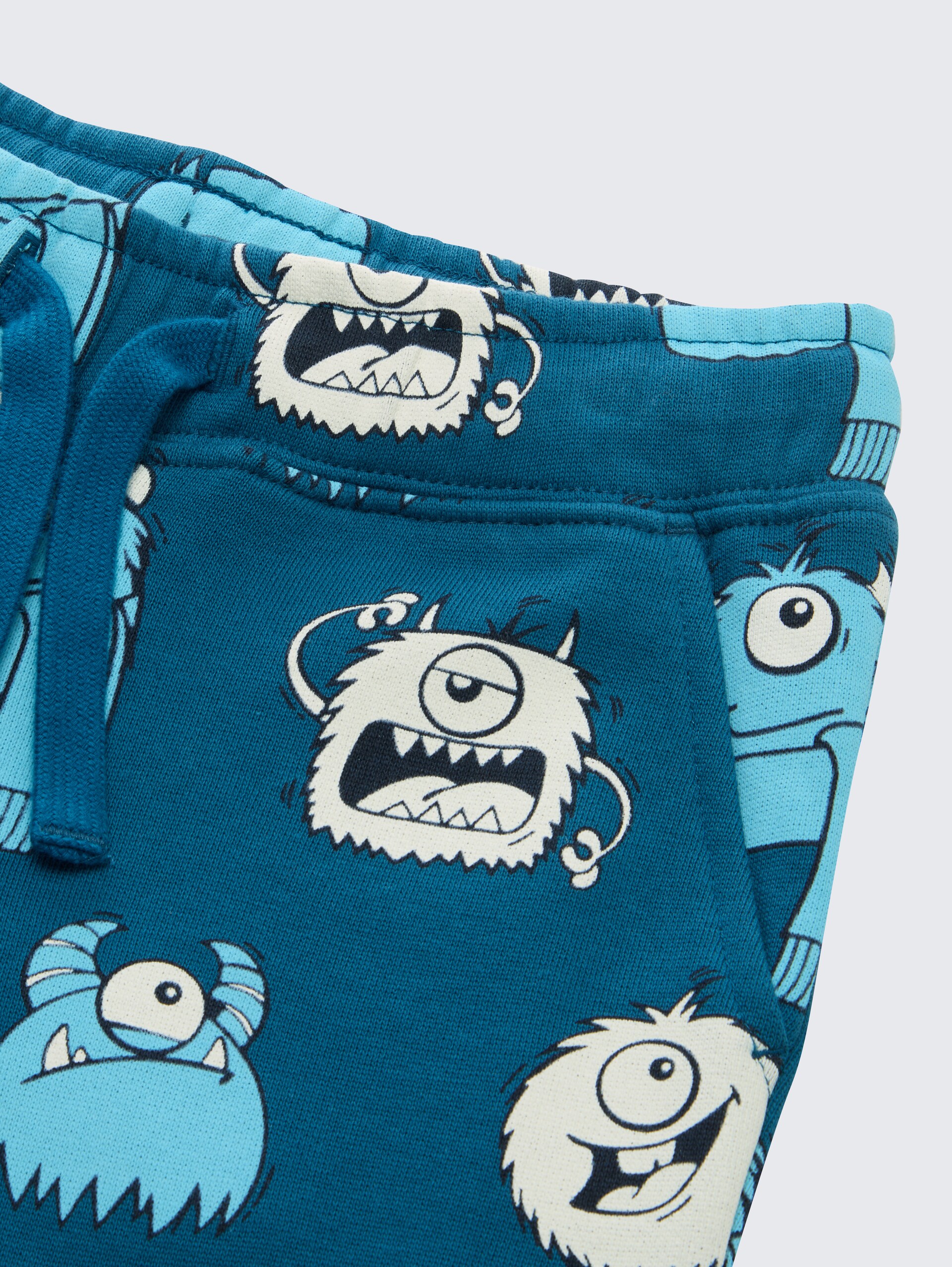 Basic Jogginghose mit Allover-Print - bluish cozy monster design