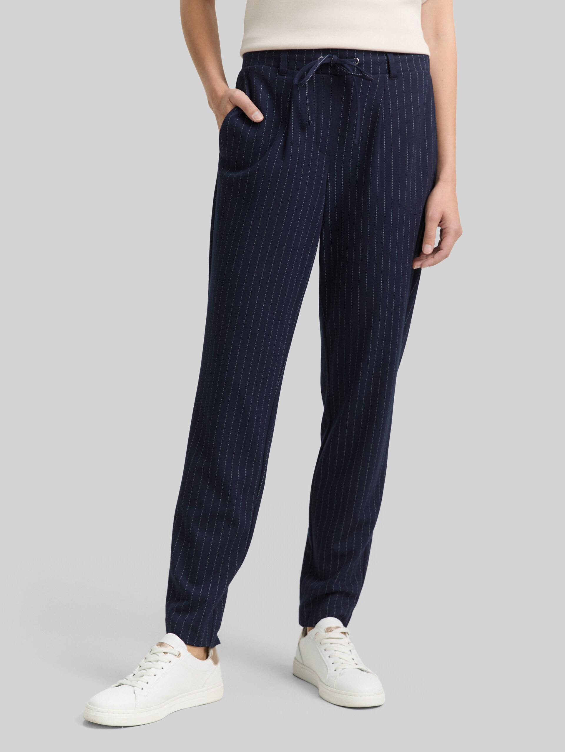 Loose fit trousers with pinstripes - navy white pinstripe - Neckline model front view