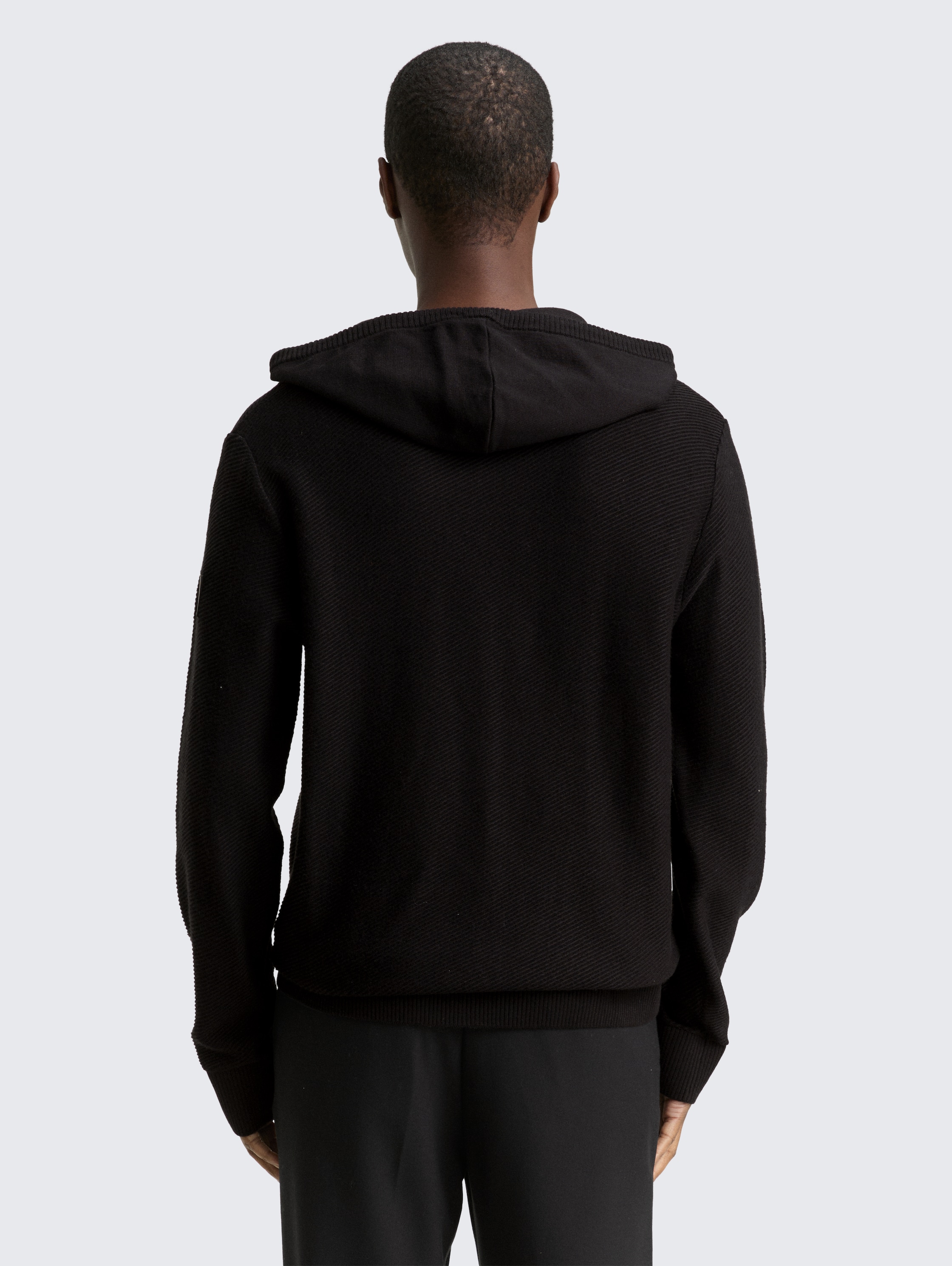 Knitted jumper with hood - black - 