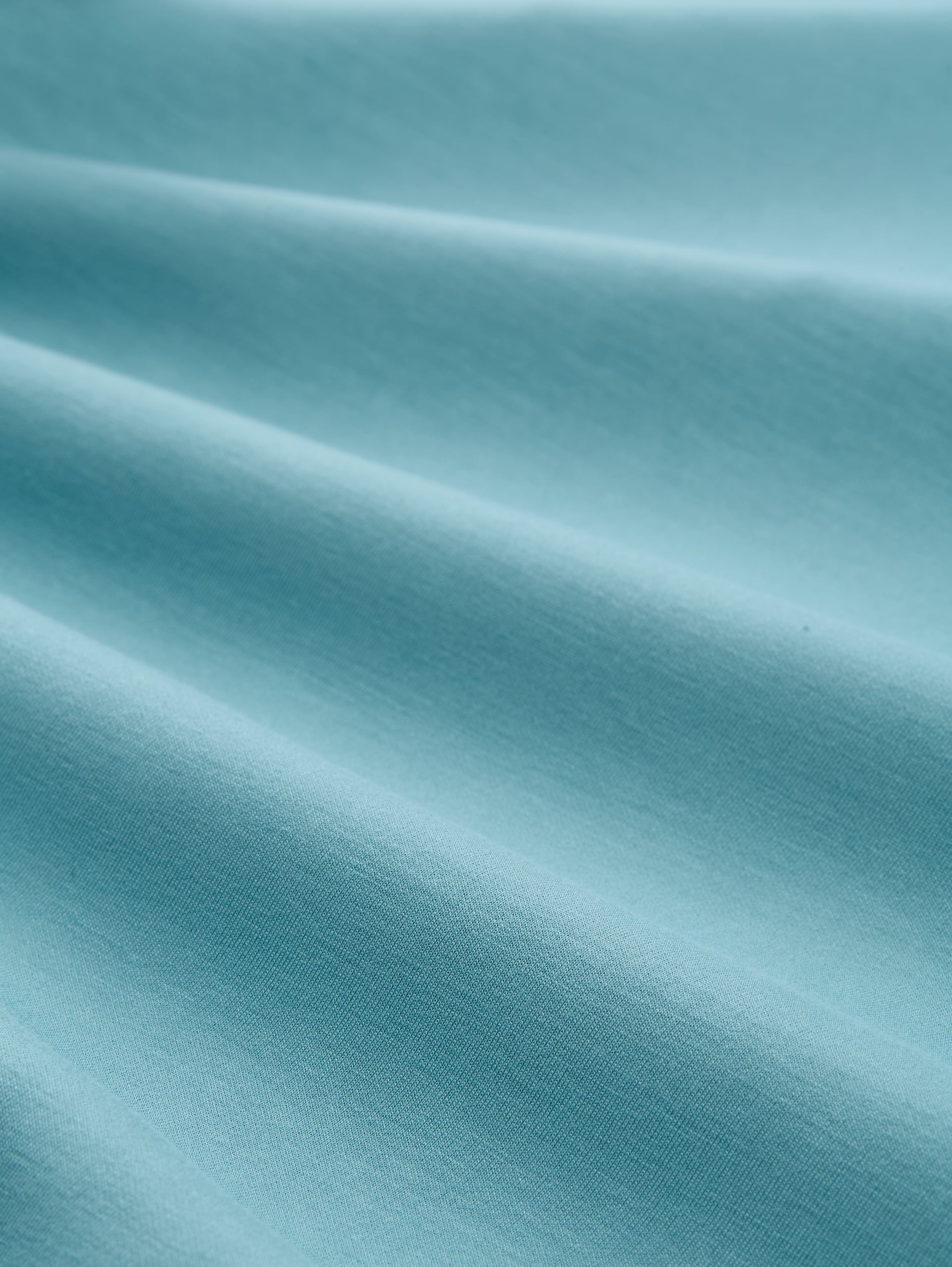 Scuba Sweatshirt mit Strasssteinen - tropical teal - Material-Ansicht