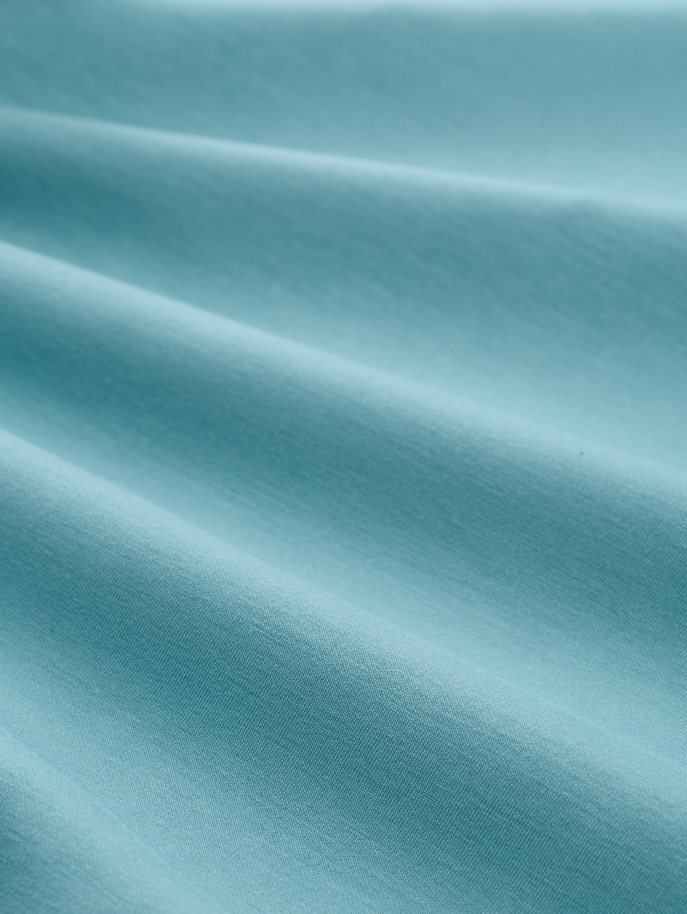 Scuba Sweatshirt mit Strasssteinen - tropical teal - Material-Ansicht