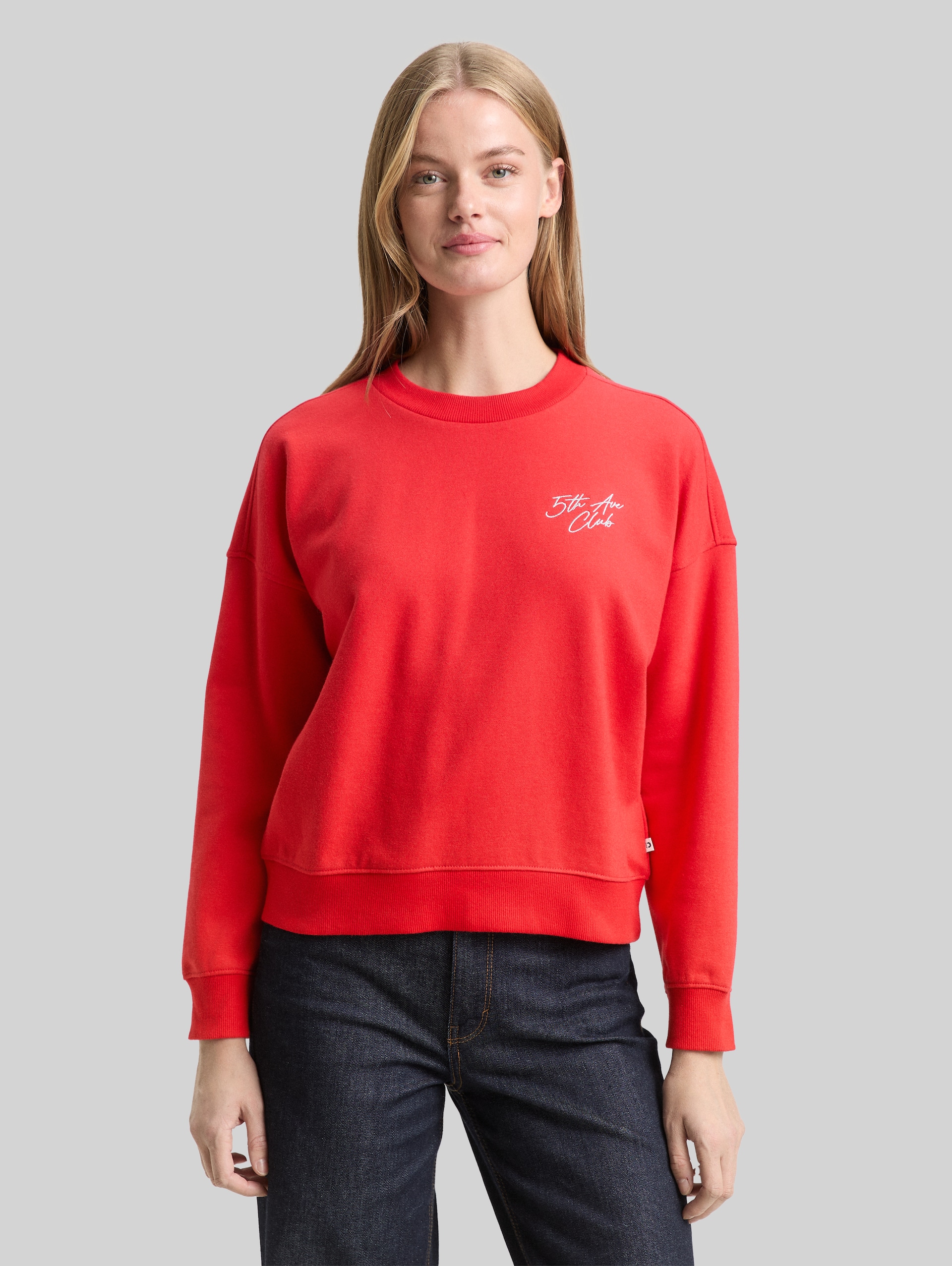 Sweatshirt with glitter embroidery - brilliant red - Neckline model front view